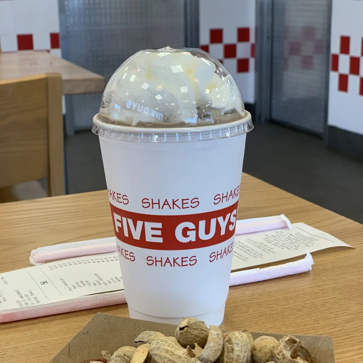 Chocolate Milkshake with Whipped Cream and Free Peanuts