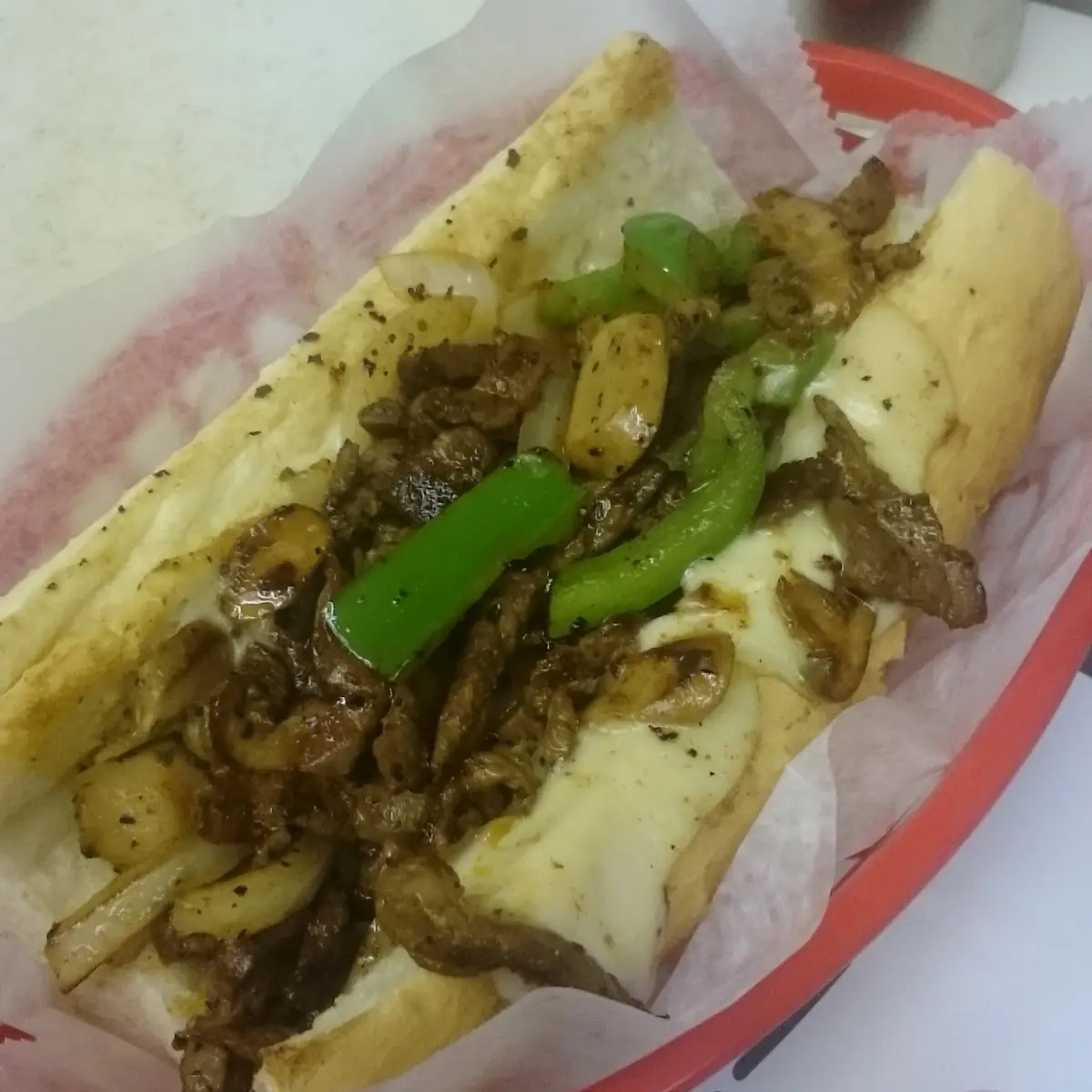 Philly Cheese Steak with Grilled Onions Mushrooms & Green Bell Peppers