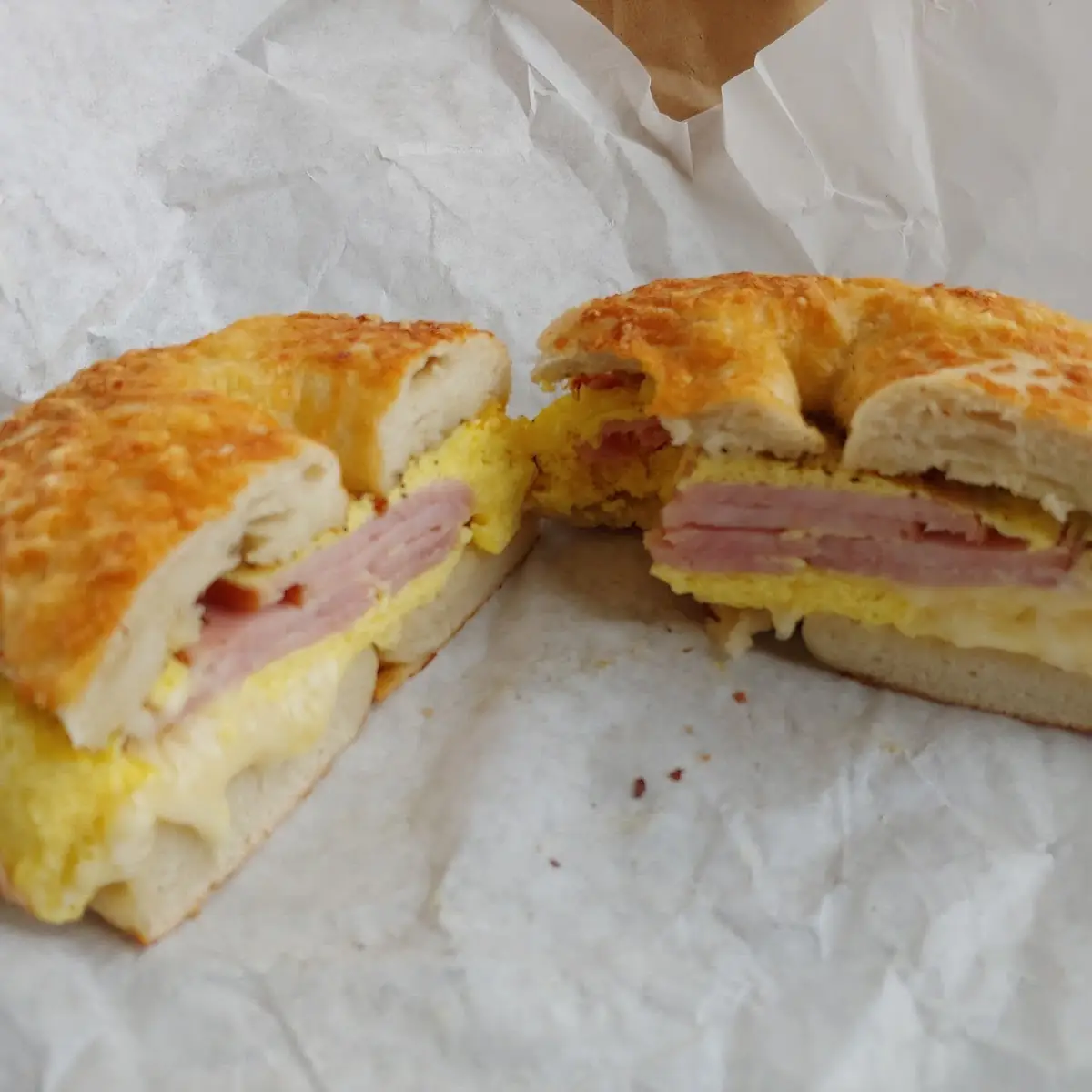 Ham Egg and Cheese on Asiago Bagel