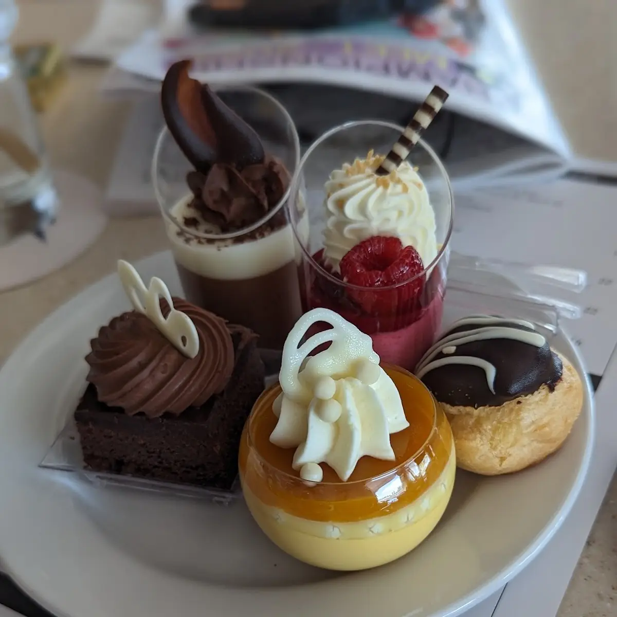 Chocolate Brownie Cream Puff Chocolate Raspberry and Mango Mousse