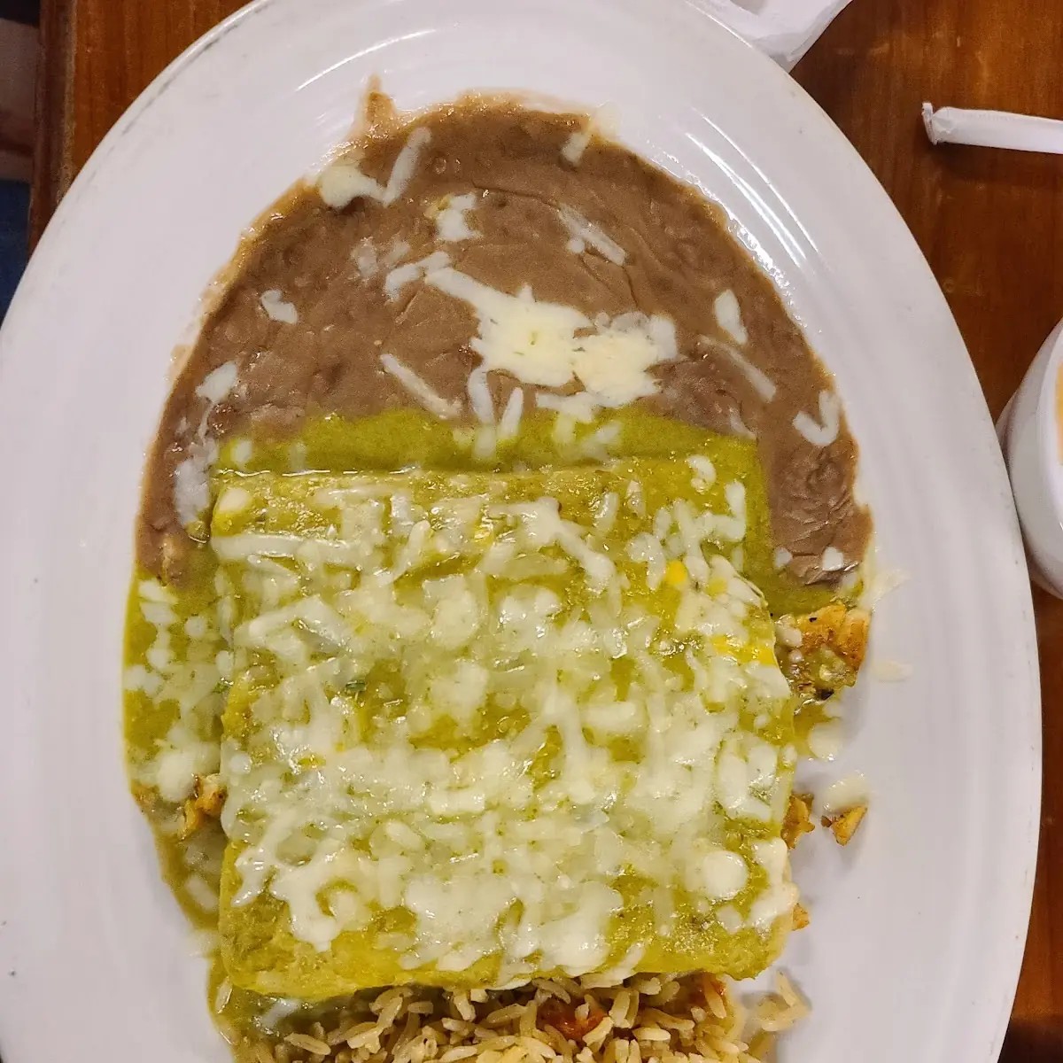 Verde Chicken Enchiladas with Rice and Beans