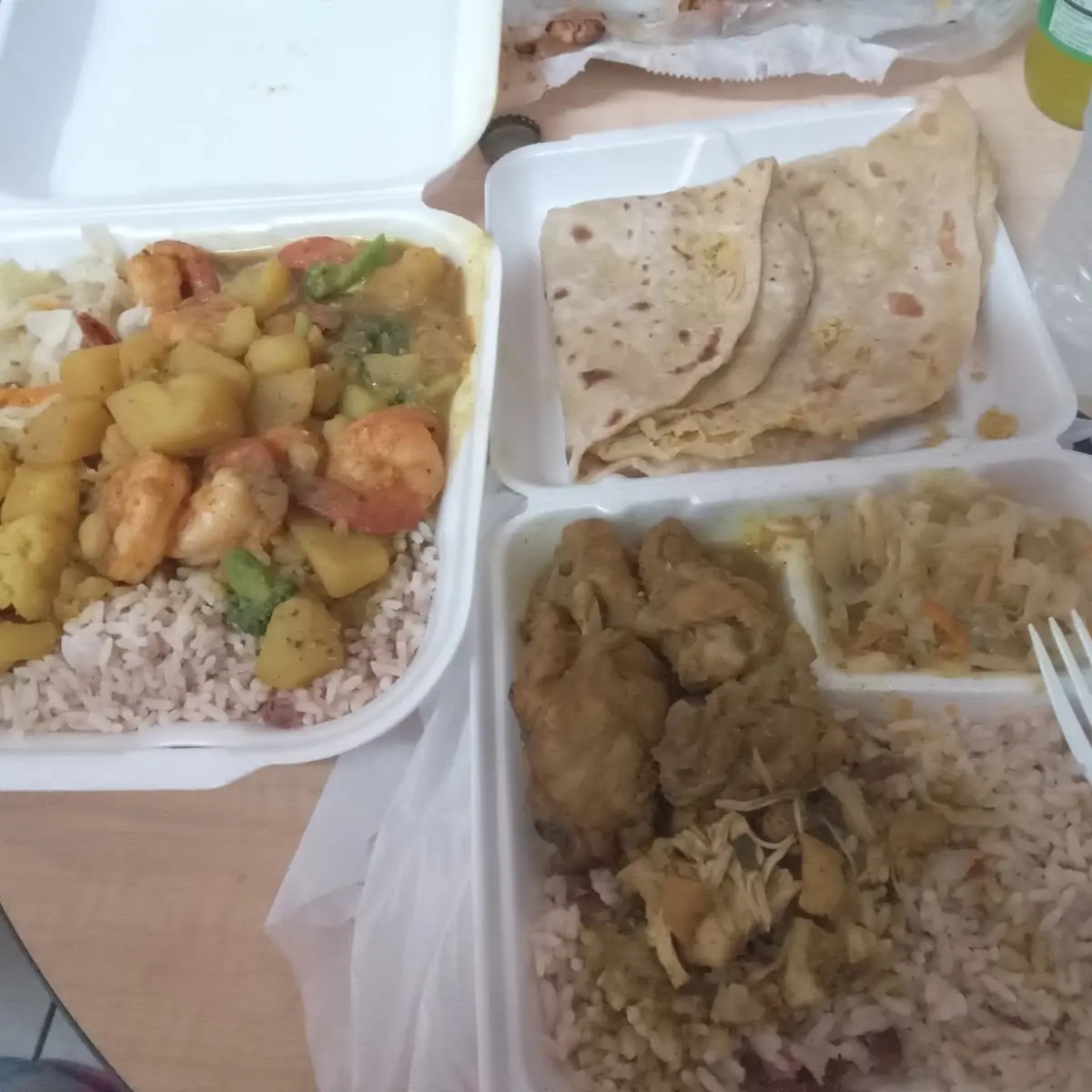 Curry Chicken Curry Shrimp with Vegetables Cabbage and Roti