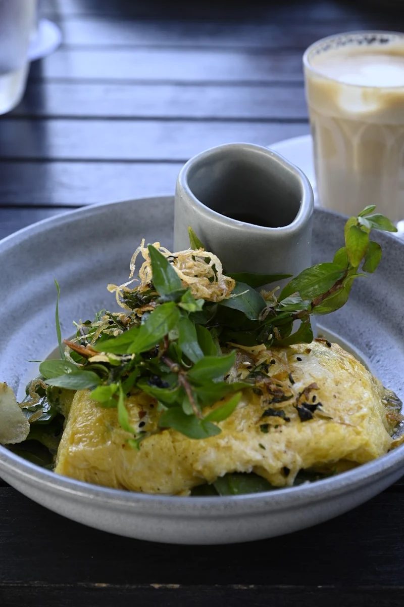 Spanner Crab Omelette Greens Ginger Caramel & White Pepper Broth