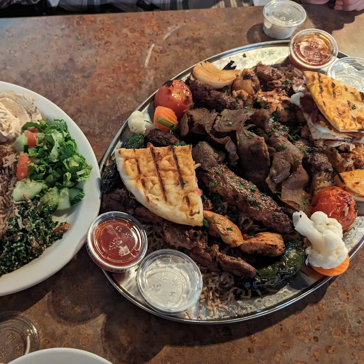 Vegetarian Platter on Left Mixed Grill Platter on Right