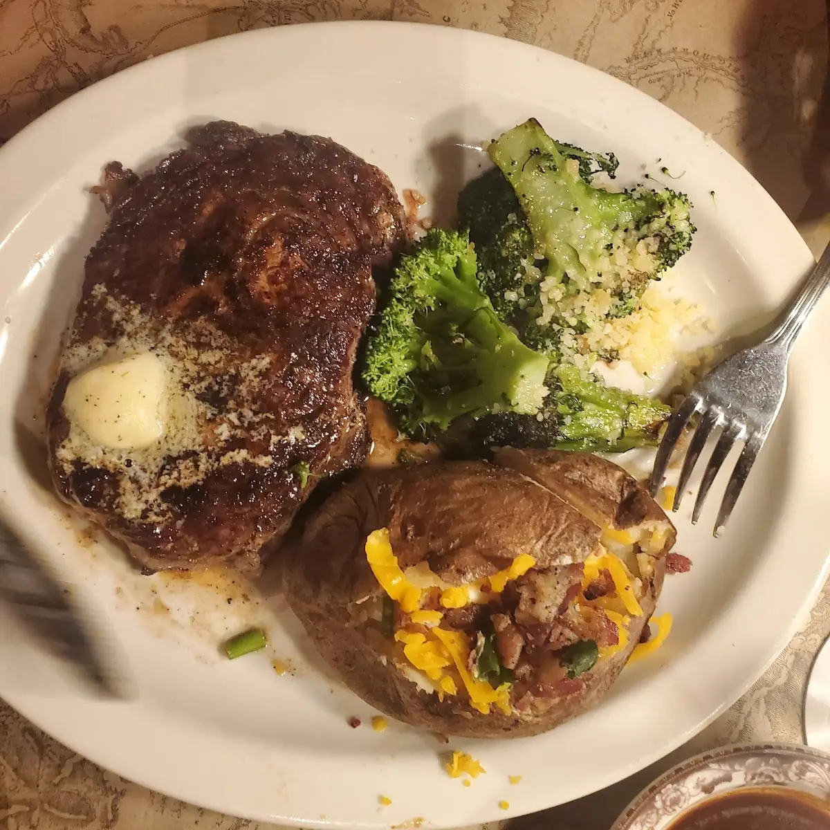Bison Ribeye Steak Broccoli and Baked Potato