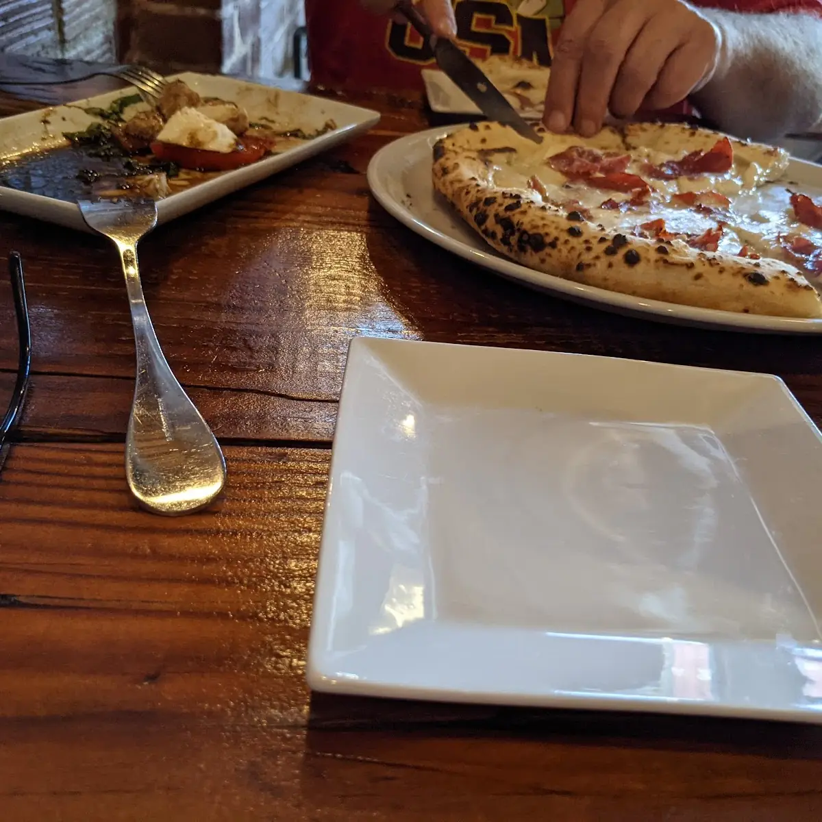 Caprese Salad and White Sauce Pizza Prosciutto
