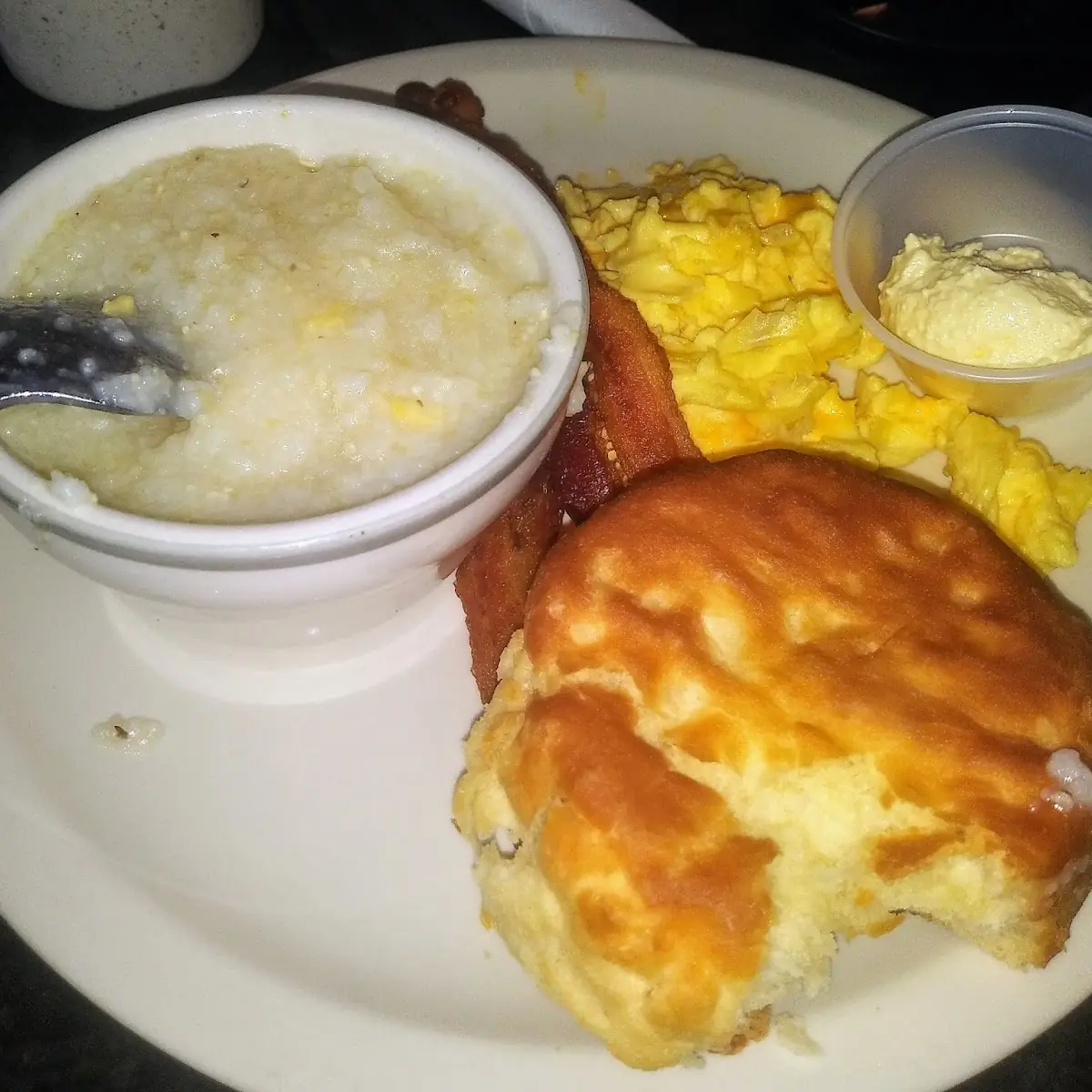Two Egg Combo Grits Scrambled Eggs w Cheese Bacon and a Biscuit