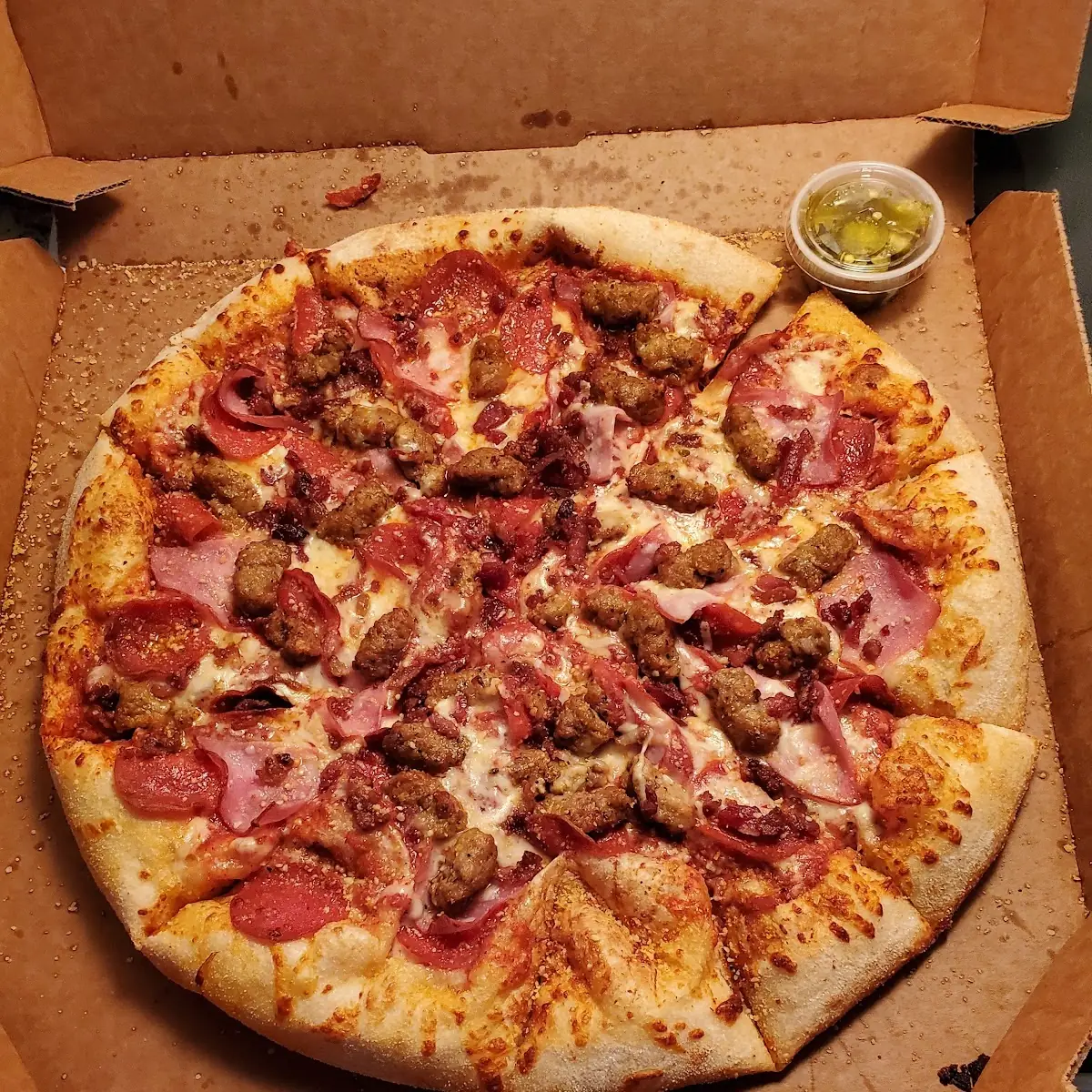 Meat Lovers Pizza and Half Works