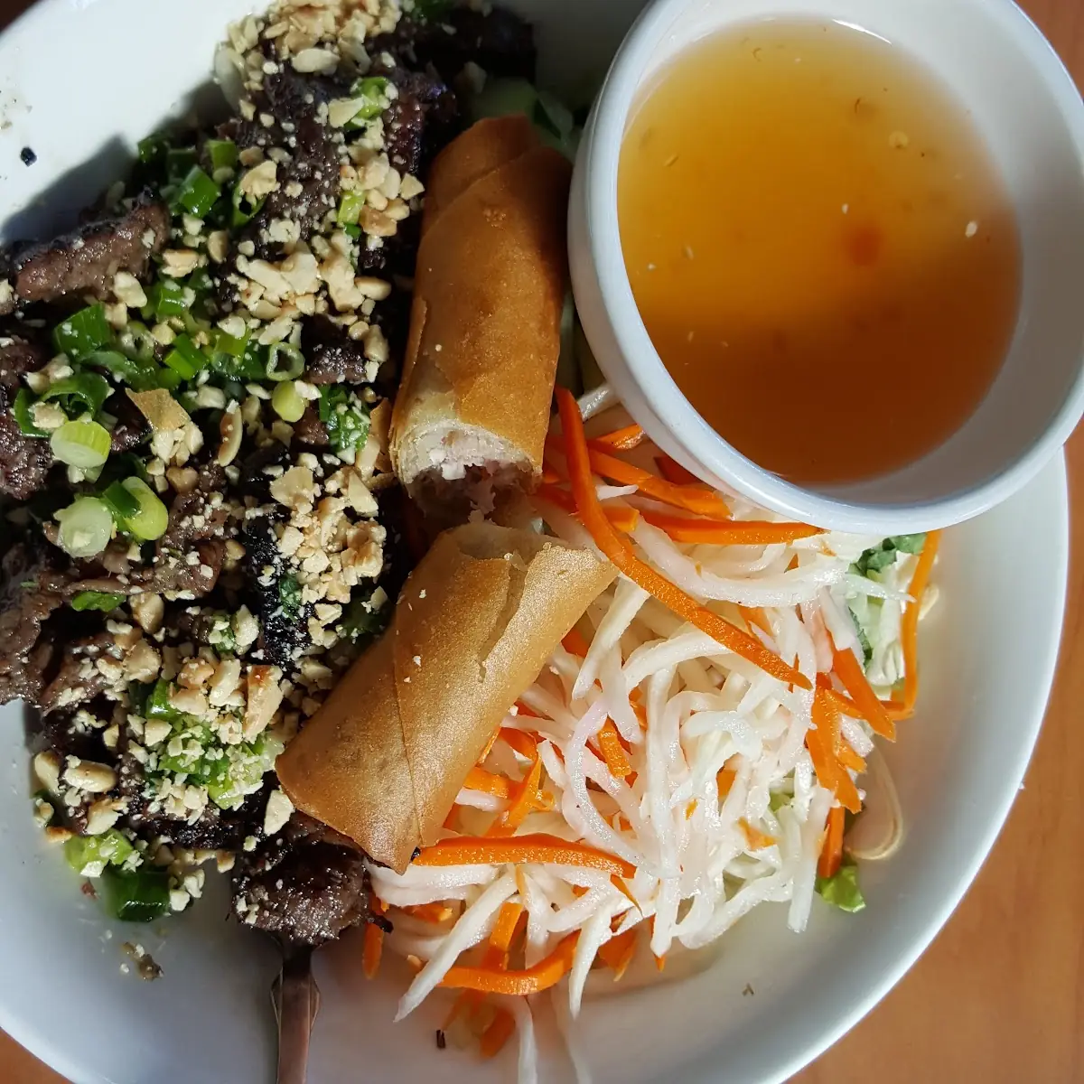 Vermicelli Bowl with Grilled Pork and Egg Roll