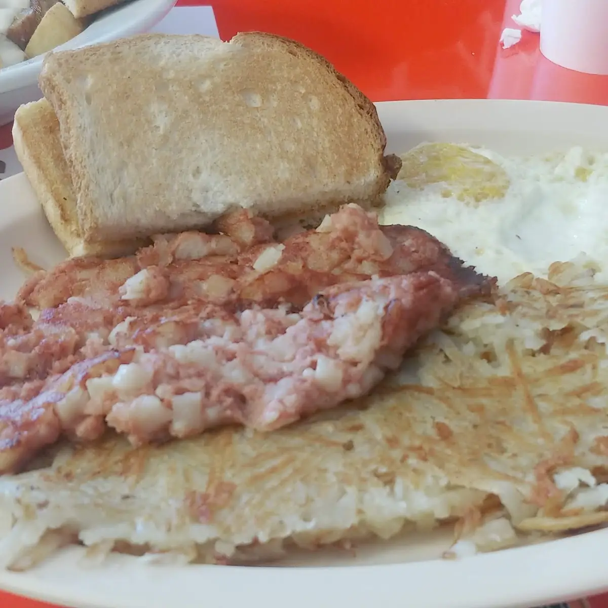 Scrambled Eggs Hash Browns and Toast