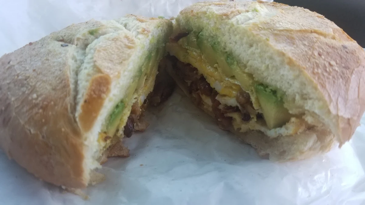 Two Eggs on a Roll with Bacon and Avocado