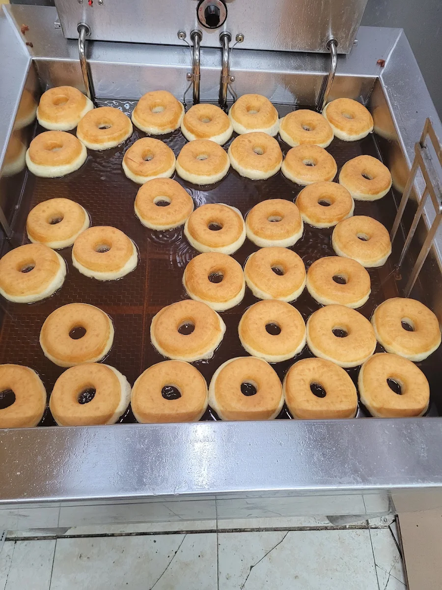 Frying Round Glazed Donut