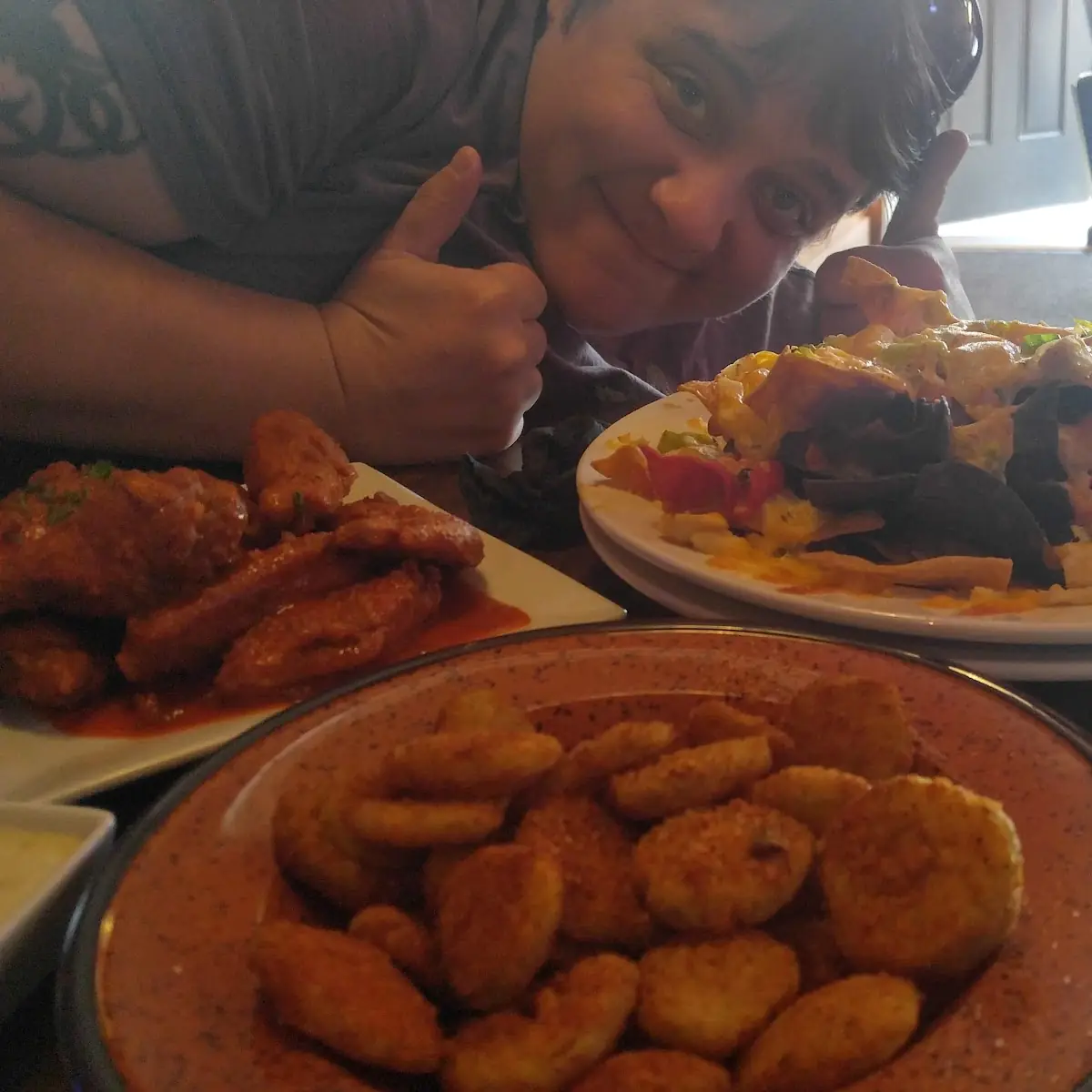 Loaded Nachos Fried Pickles and Buffalo Wings