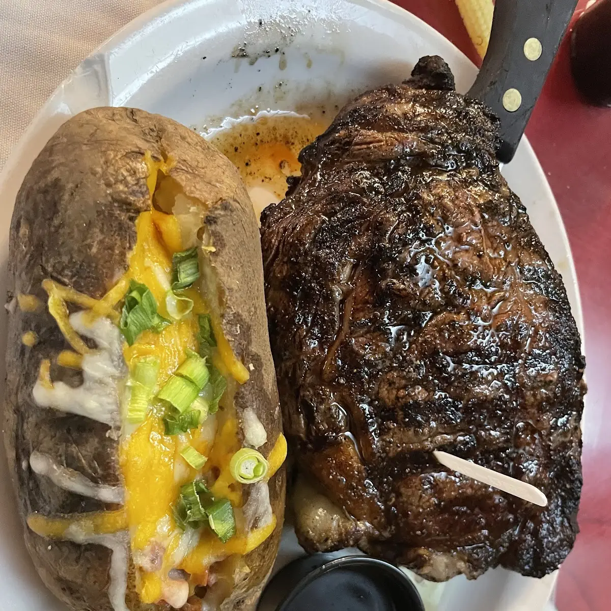 Ribeye Steak with Creamed Spinach and Side of Blackened Shrimp