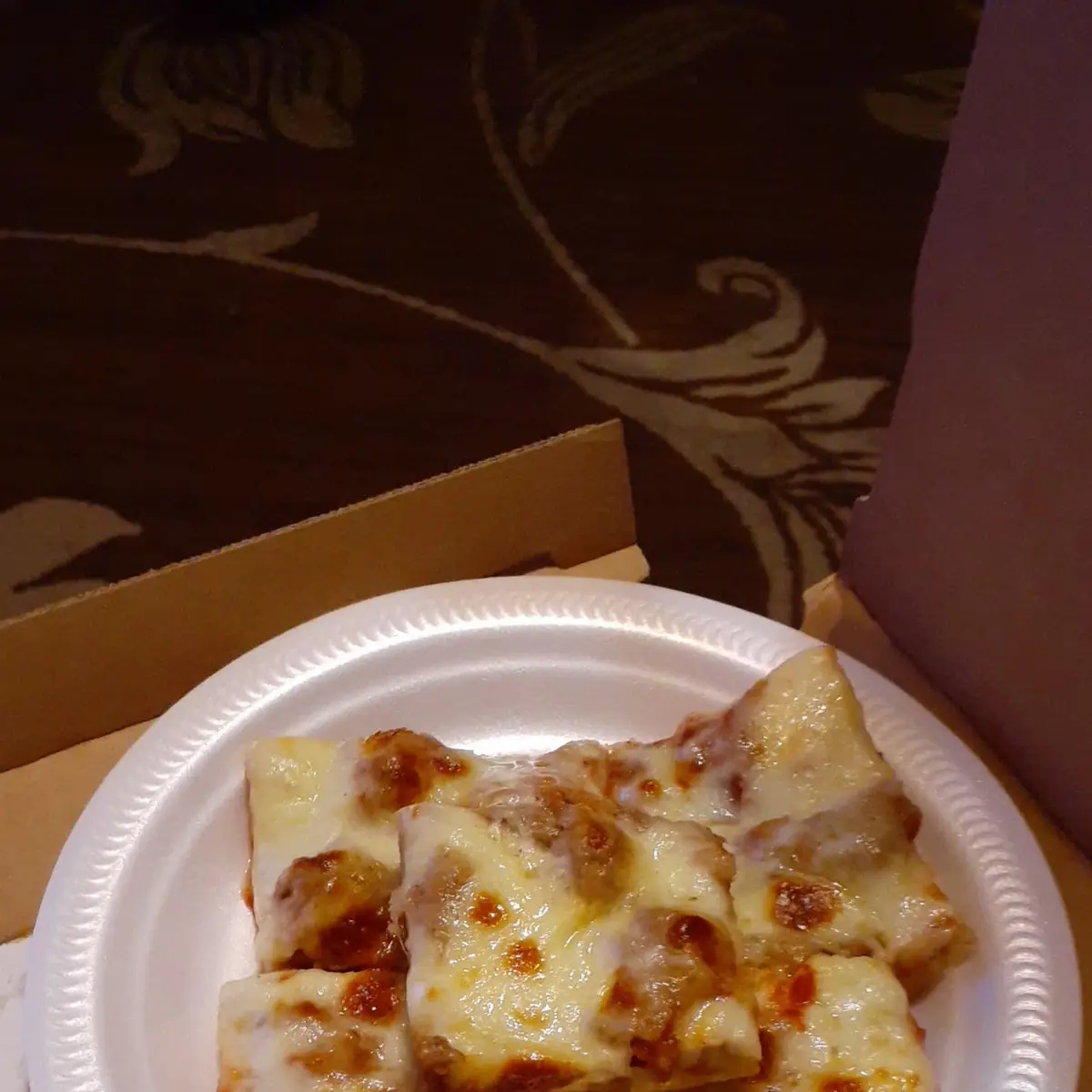 Thin Crust Pizza with Sausage and Garlic