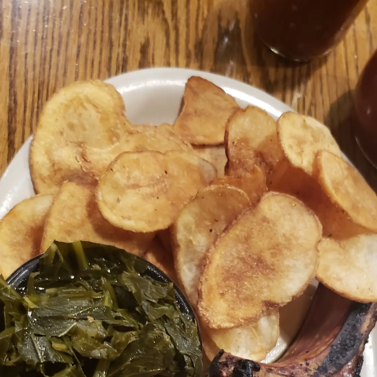 Pork Chop with Collards and House Chips