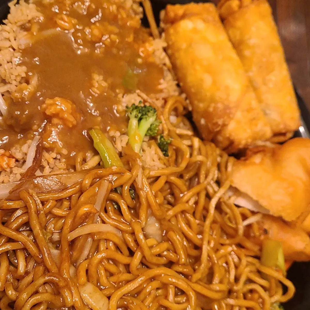 Vegetable Lo Mein with Egg Rolls Almond Chicken and Rice with Brown Gravy