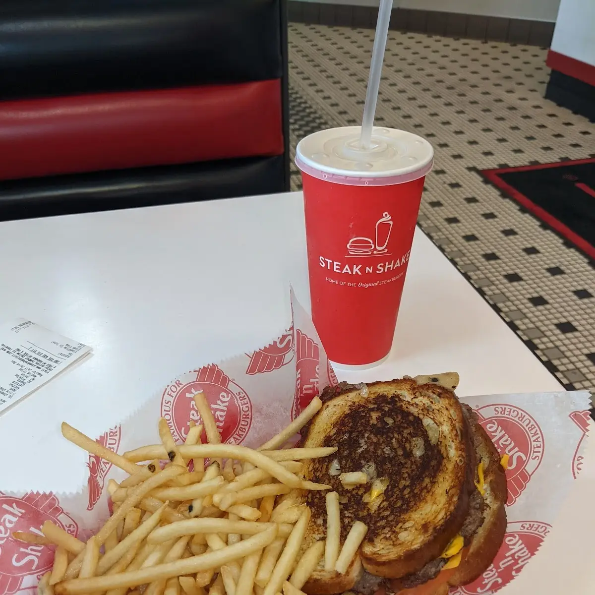 Triple Steak Burger with Cheese on Grilled Sourdough Bread