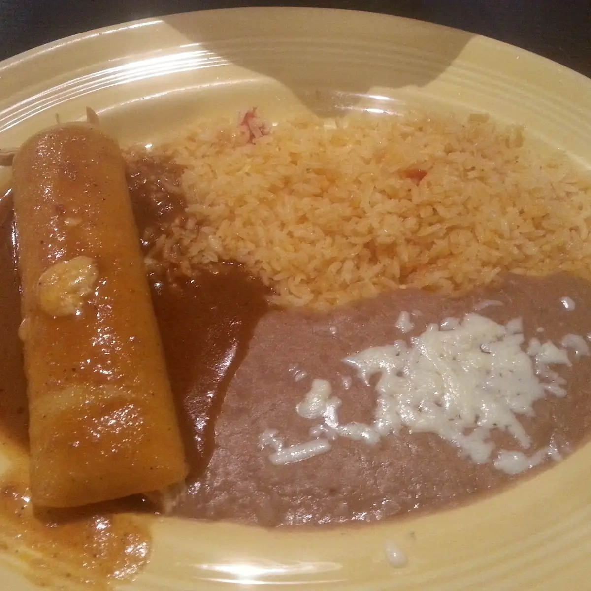 Chicken Enchilada with Refried Beans and Rice