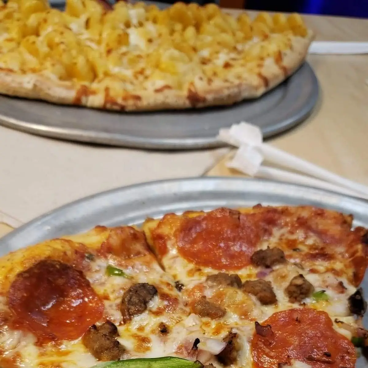 Supreme Pizza and Mac N Cheese Pizza