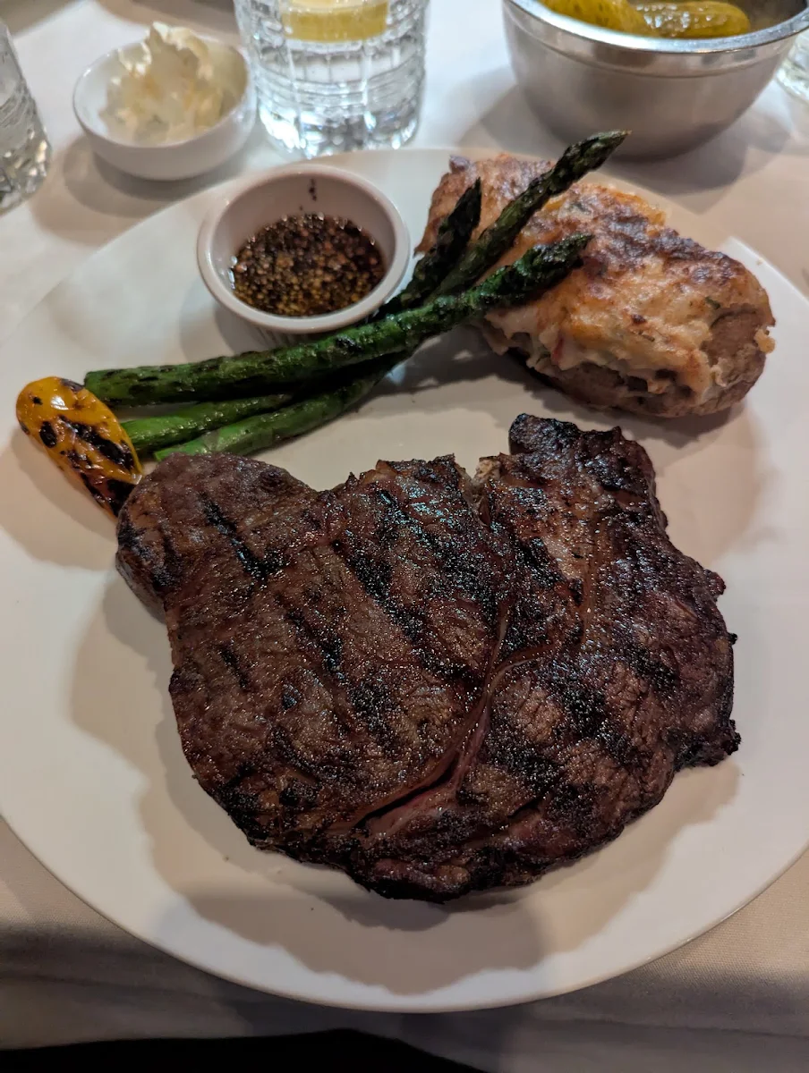 Rib Steak Gibbys Cut with Fresh Steamed Asparagus and Monte Carlo