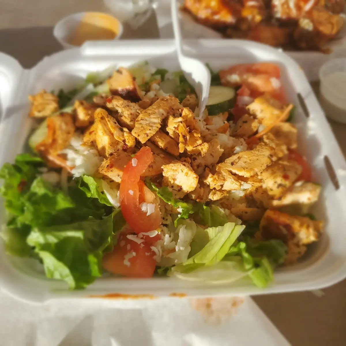 Chicken Beef or Gyro over Rice Shredded Lettuce Ranch and Hot Sauce