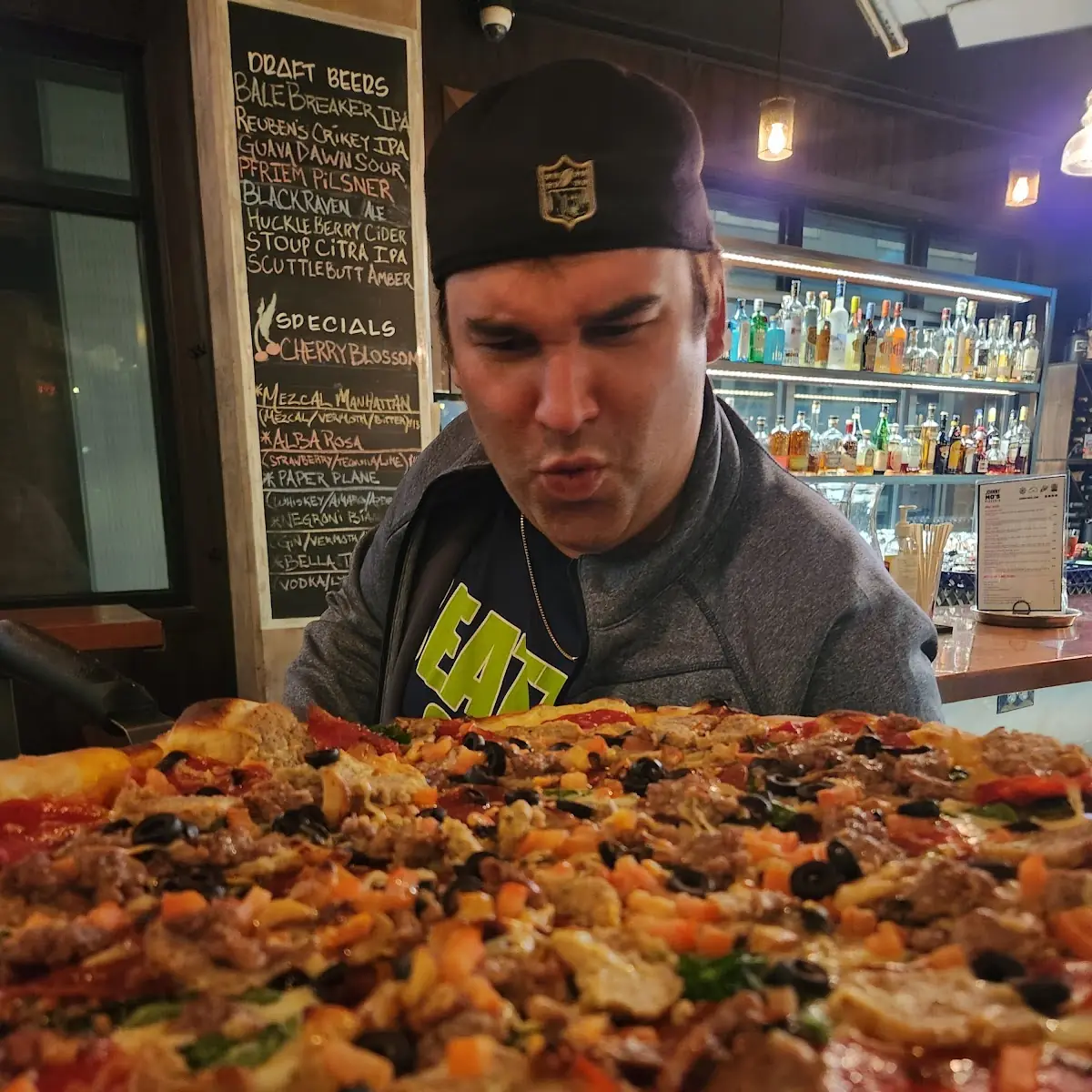 Vegetarian Pizza with All Meat Pizza