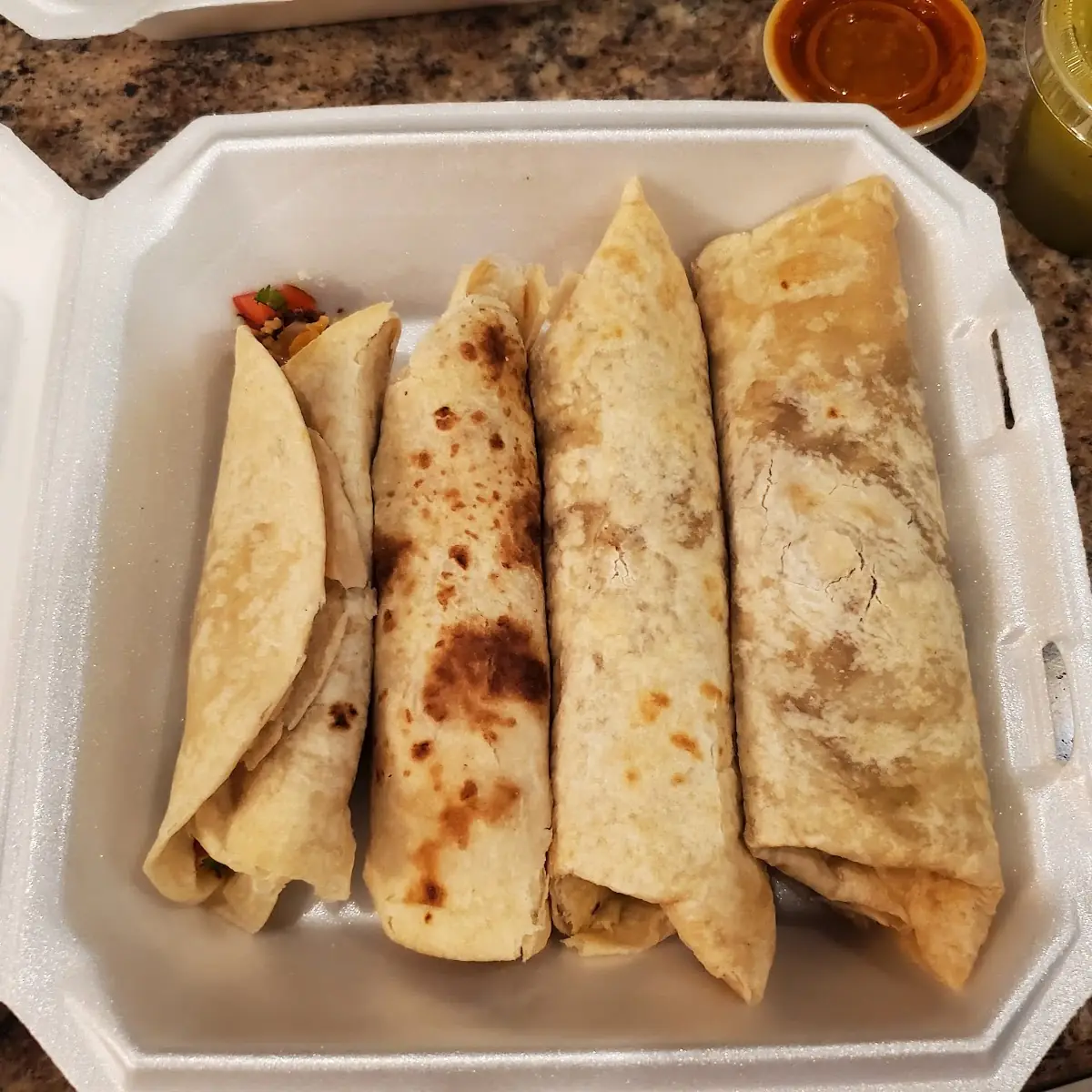 Marinated Beef Burrito Left Pork N Potato Burrito Right