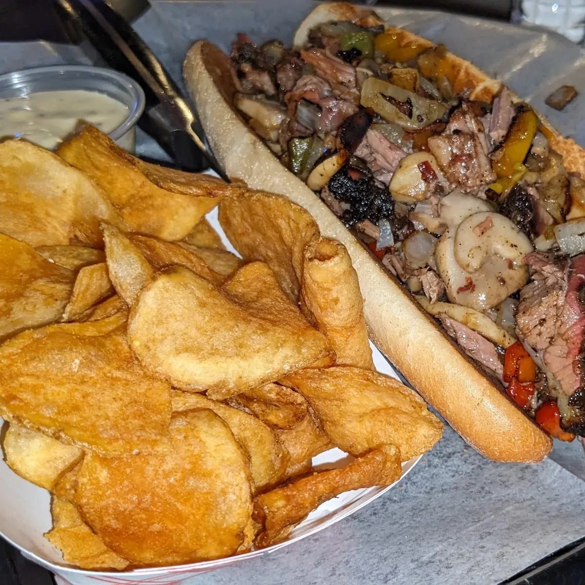Brisket Cheese Steak Sandwich with Chips