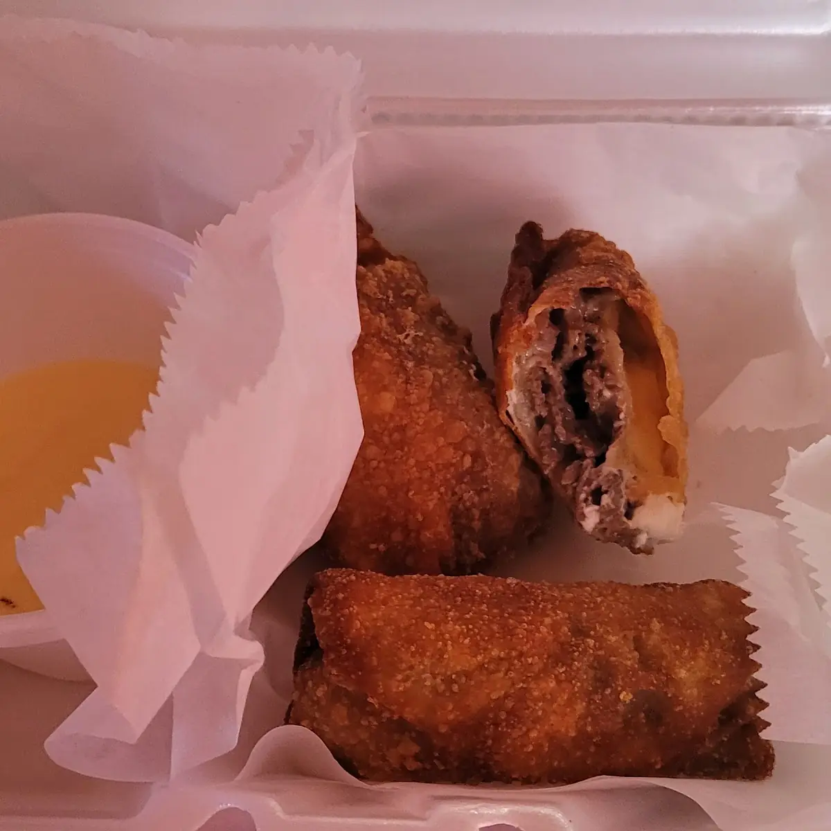 Cheesesteak Egg Rolls with Cheese Sauce