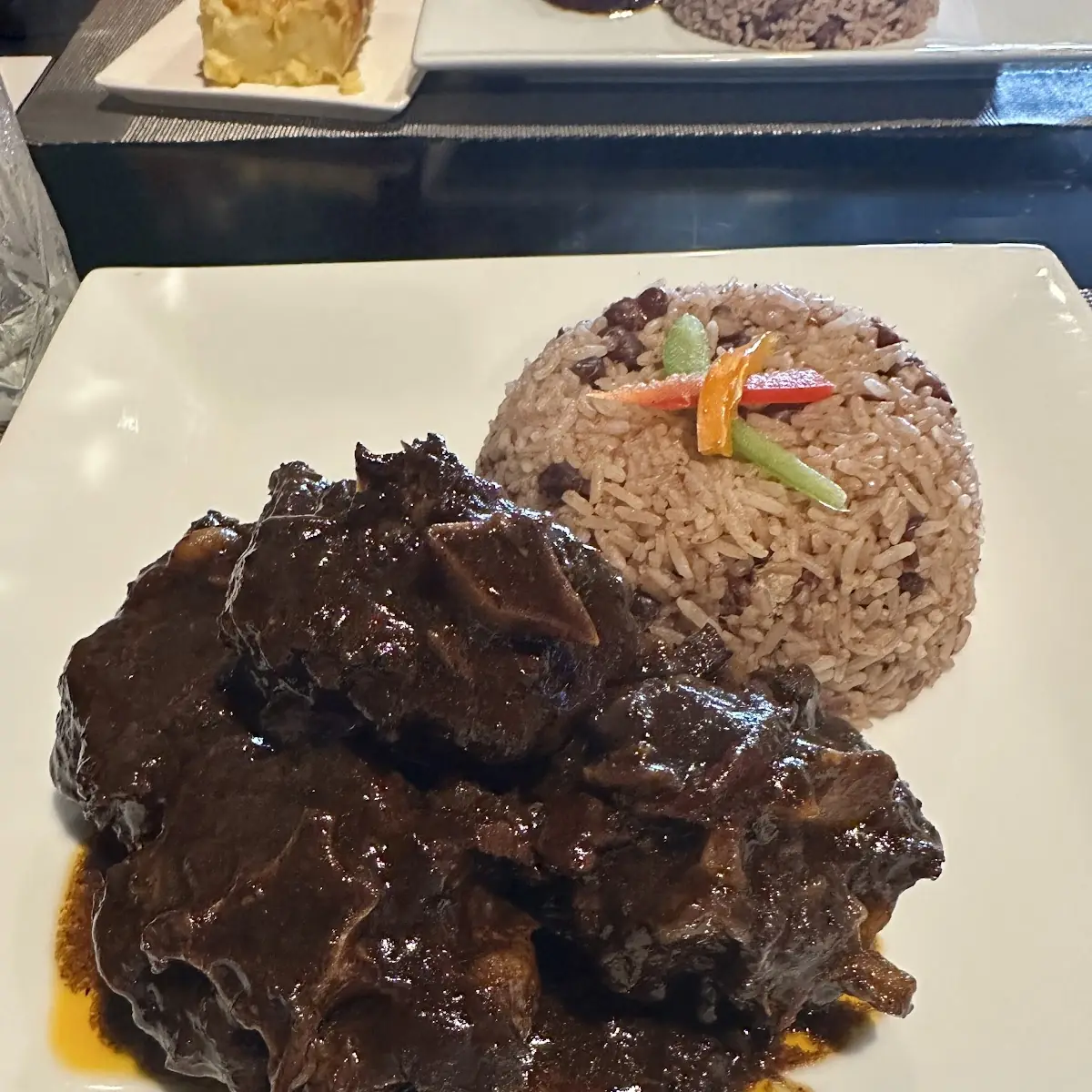 Oxtails with Rice and Potato Salad