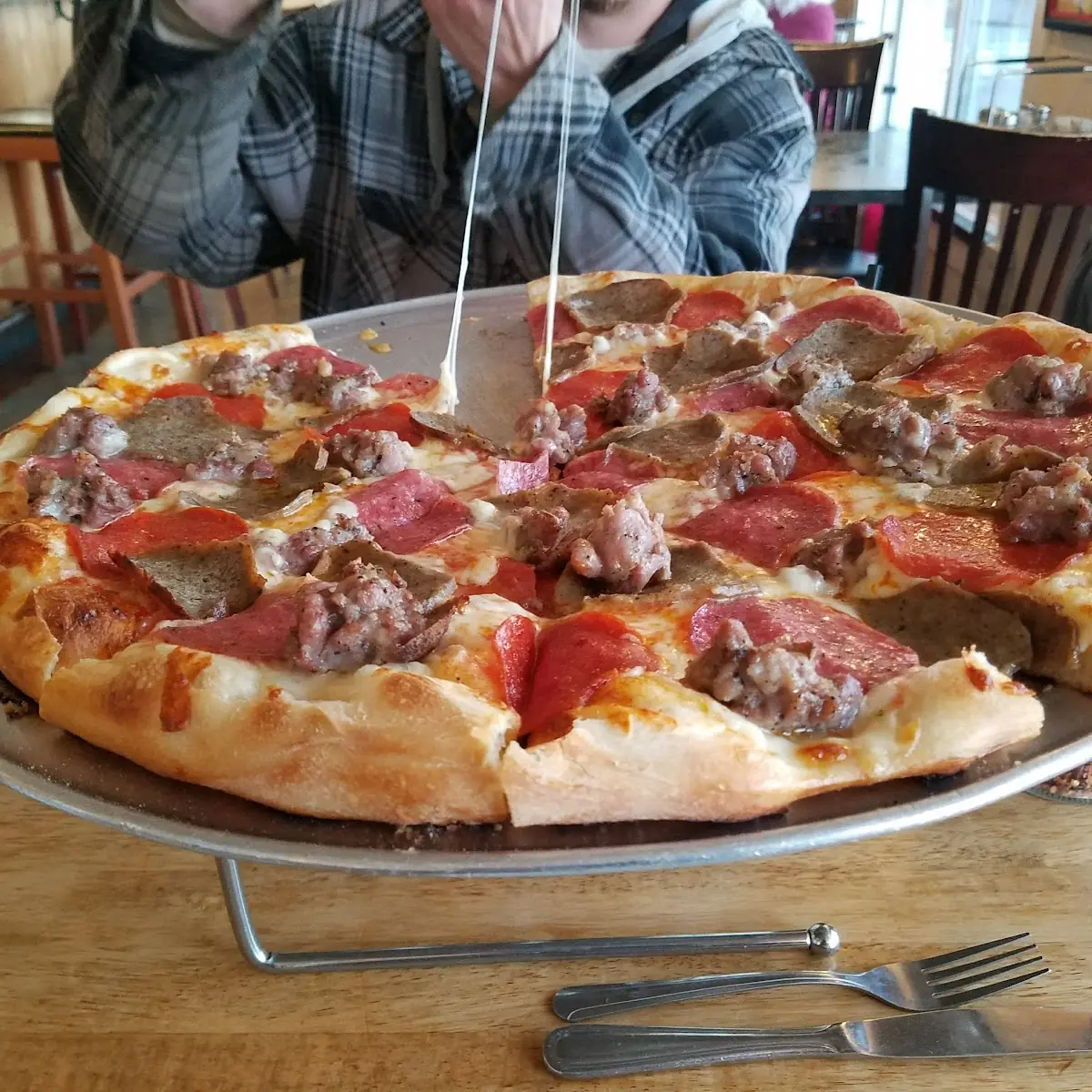Sausage Pepperoni with Extra Cheese Pizza