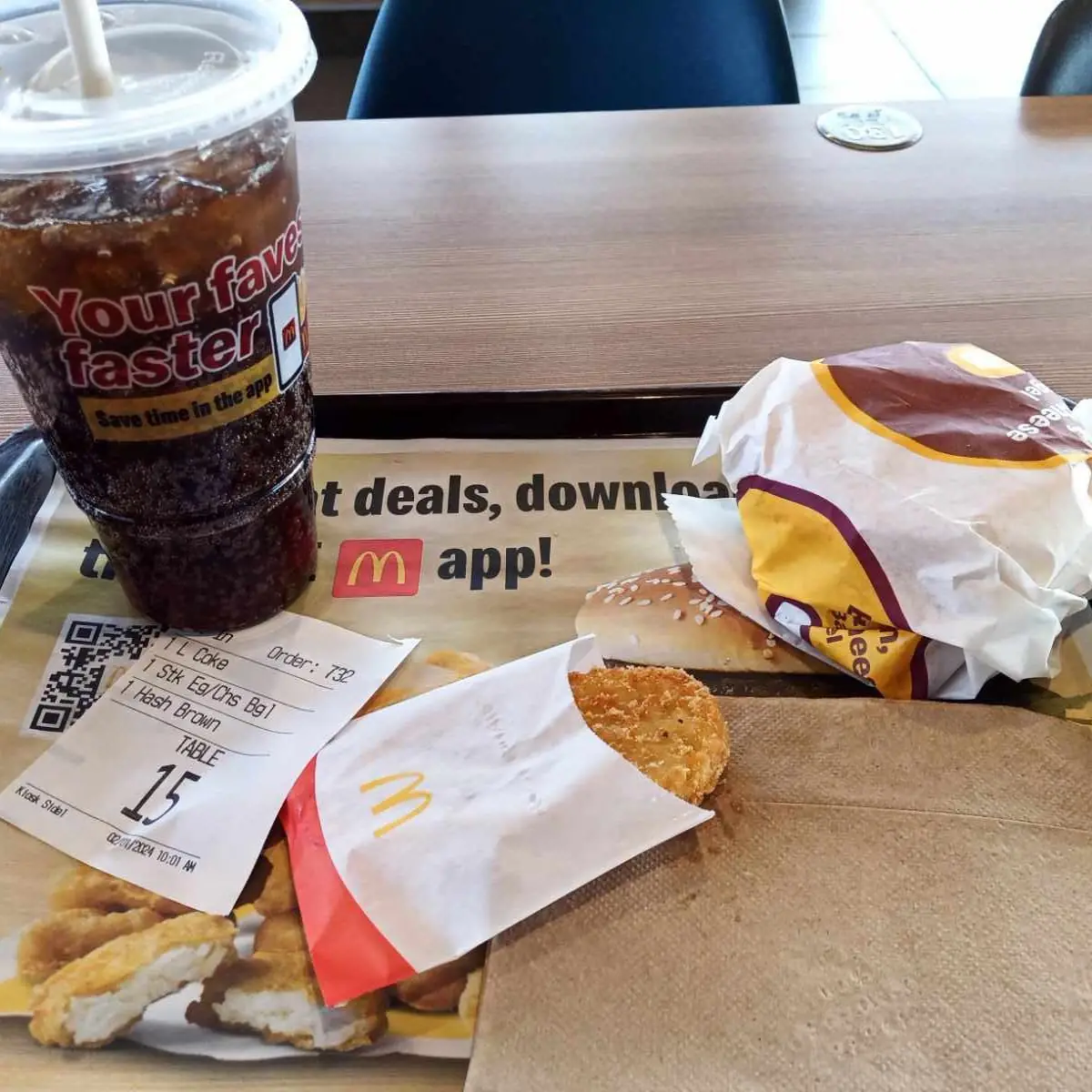 Steak Egg & Cheese Bagel with Hash Browns and a Coke