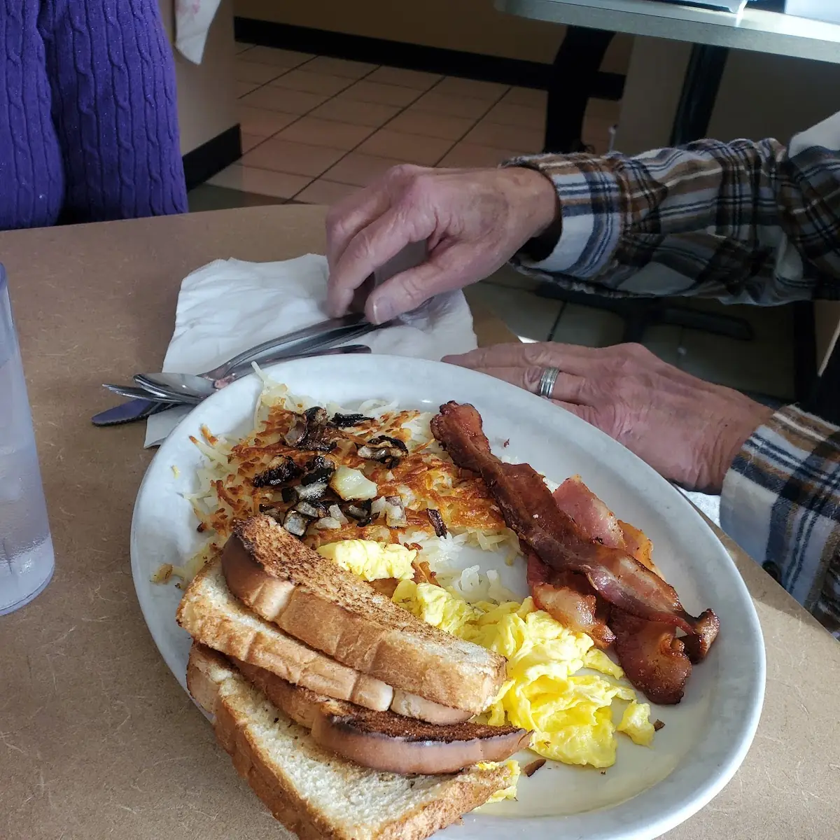One Scrambled Egg and 2 Bacon Strips