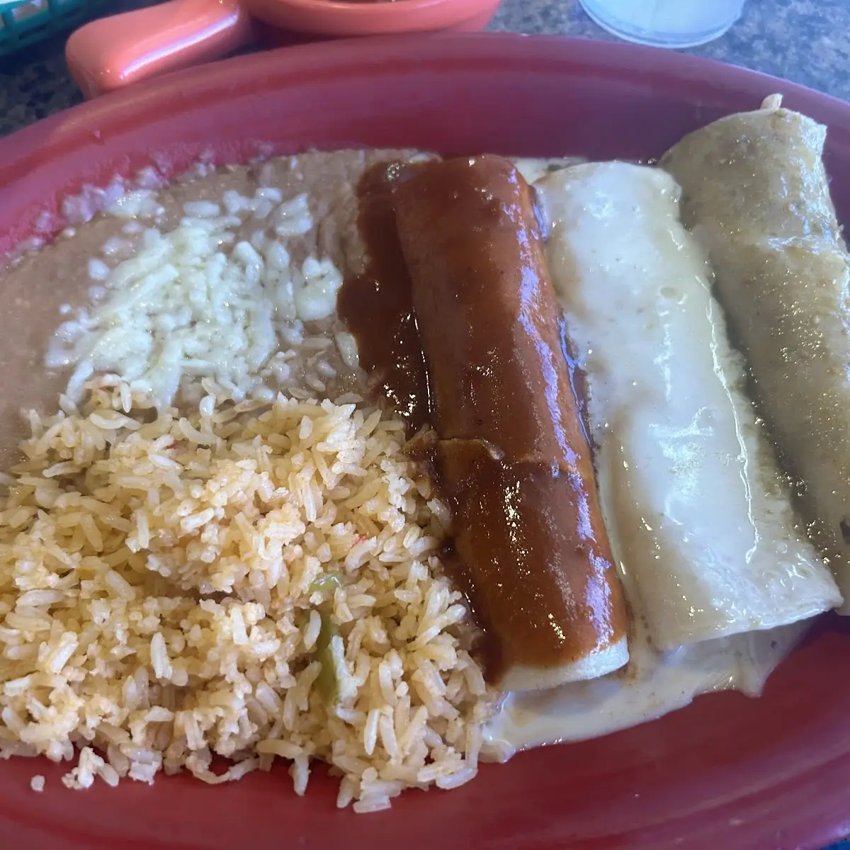 Enchilada 1 PC Tamal 1 PC Rice & Beans