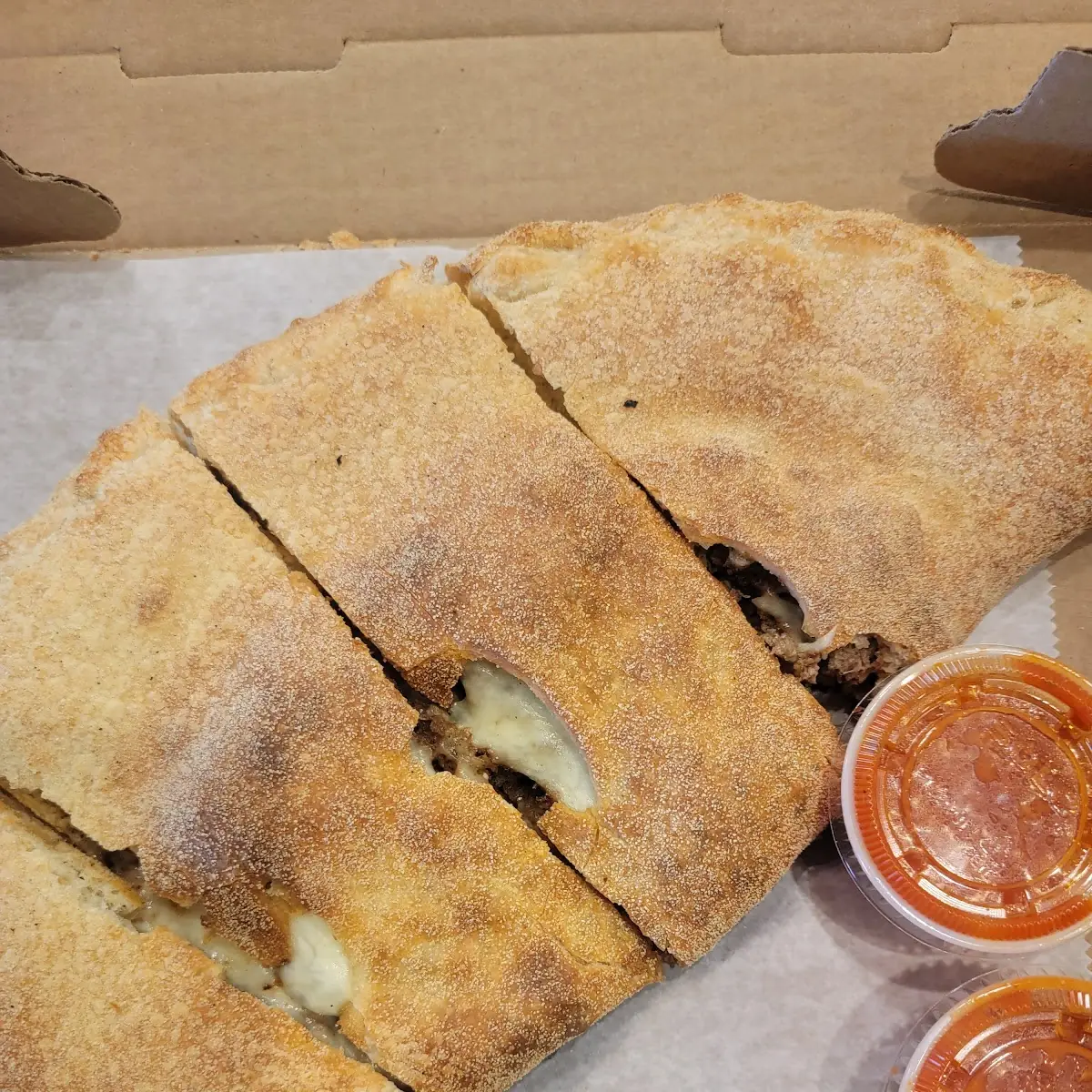Steak & Cheese Calzone with Peppers & Onions