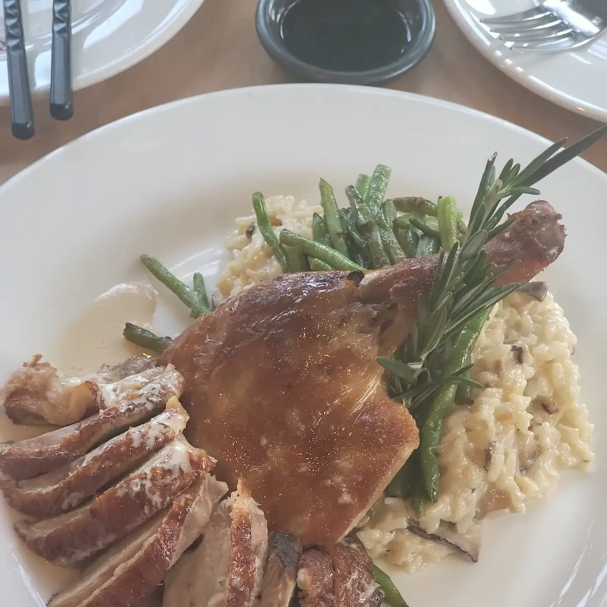 Roasted Duck Confit with Mushroom Risotto