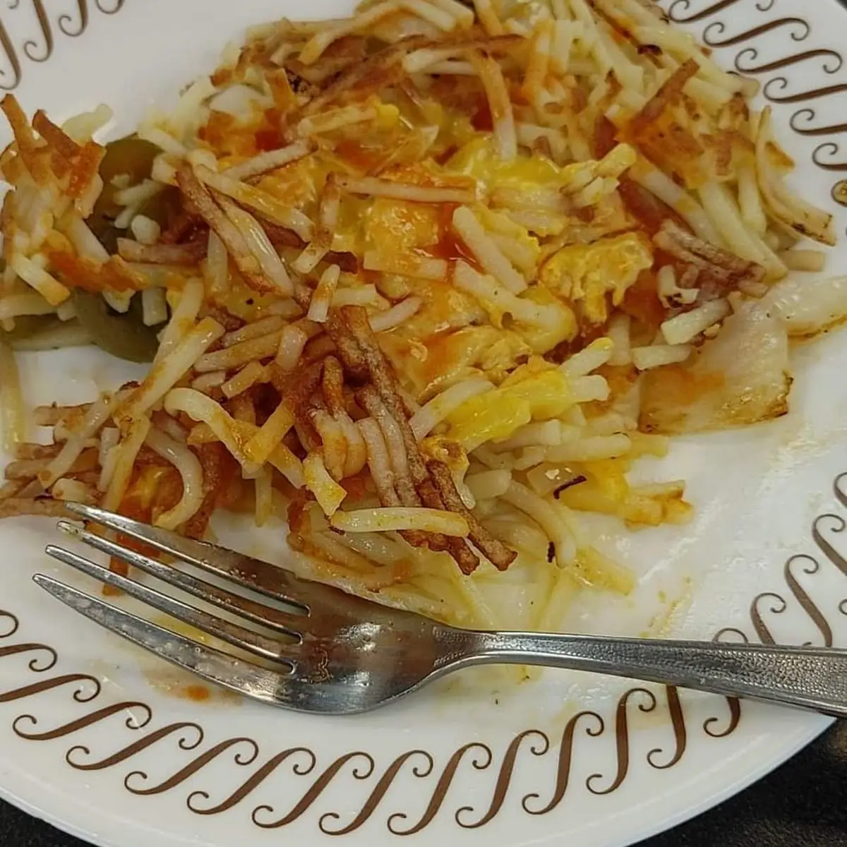 Scattered Hashbrowns with Jalapenos Onion Cheese with Tabasco Sauce