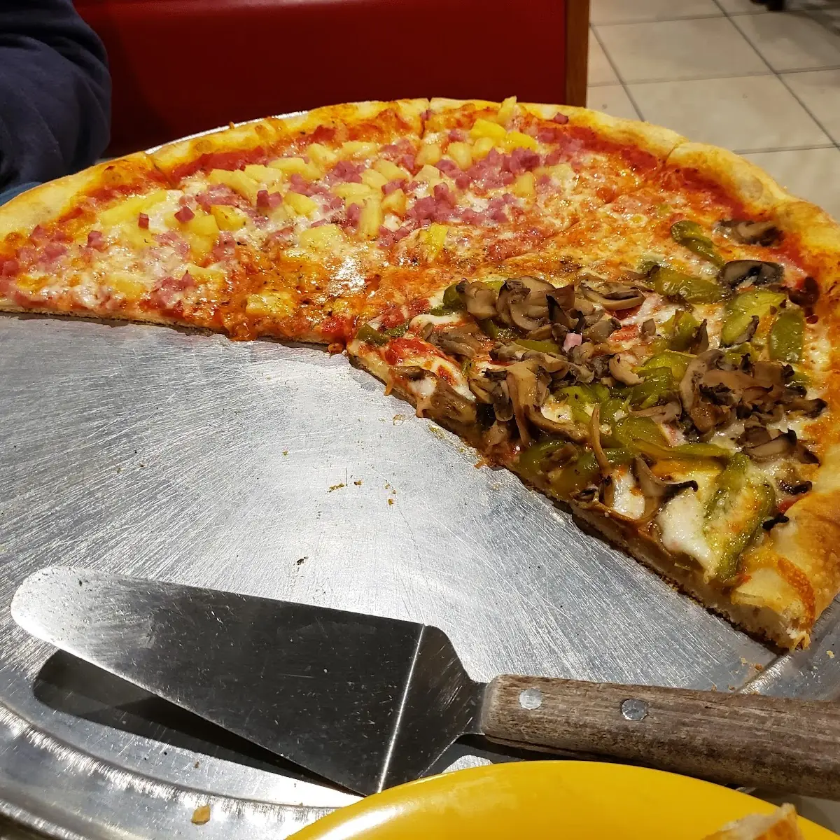 Half Ham and Pineapple Half Veggie Pizza