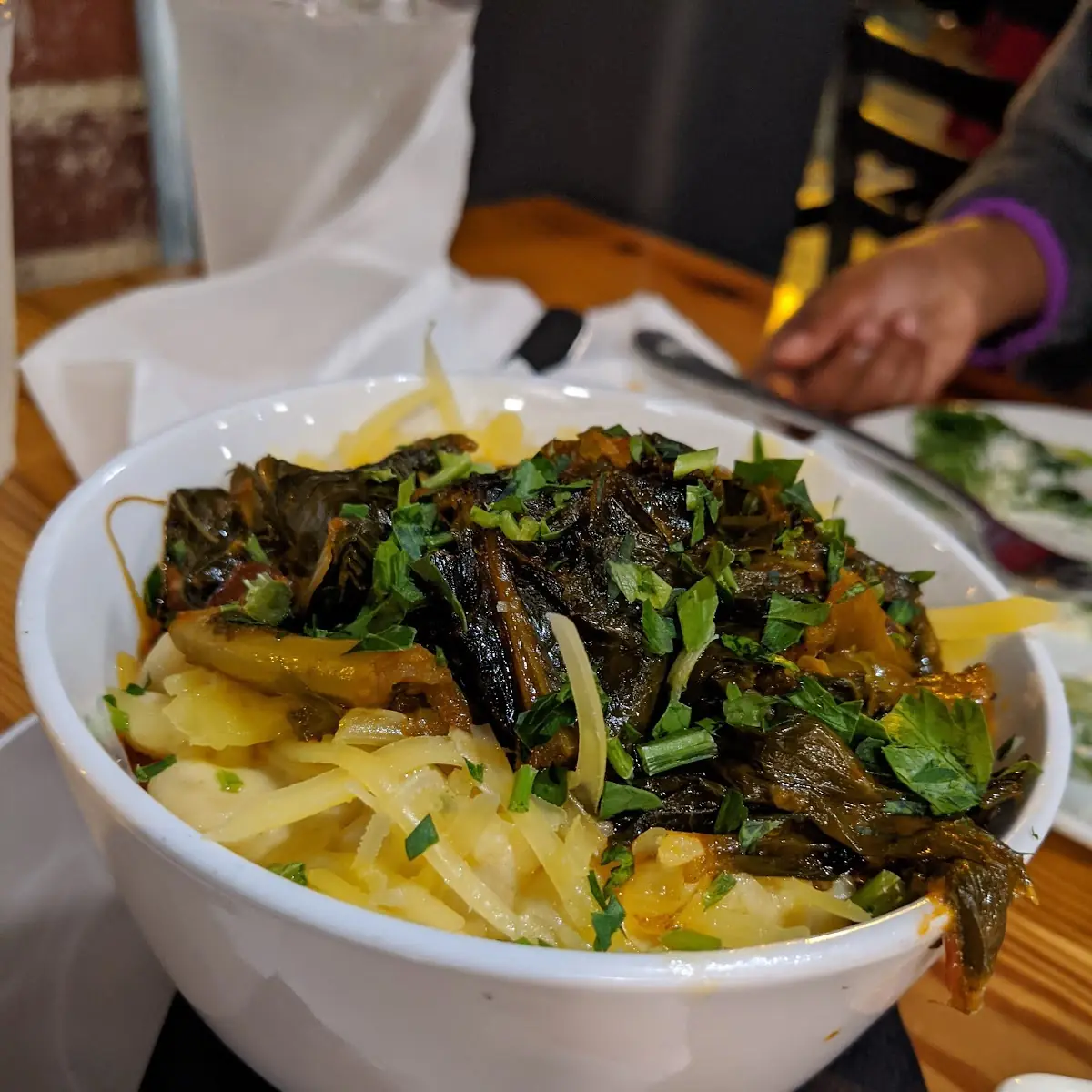 Mac and Cheese Topped with Collard Greens