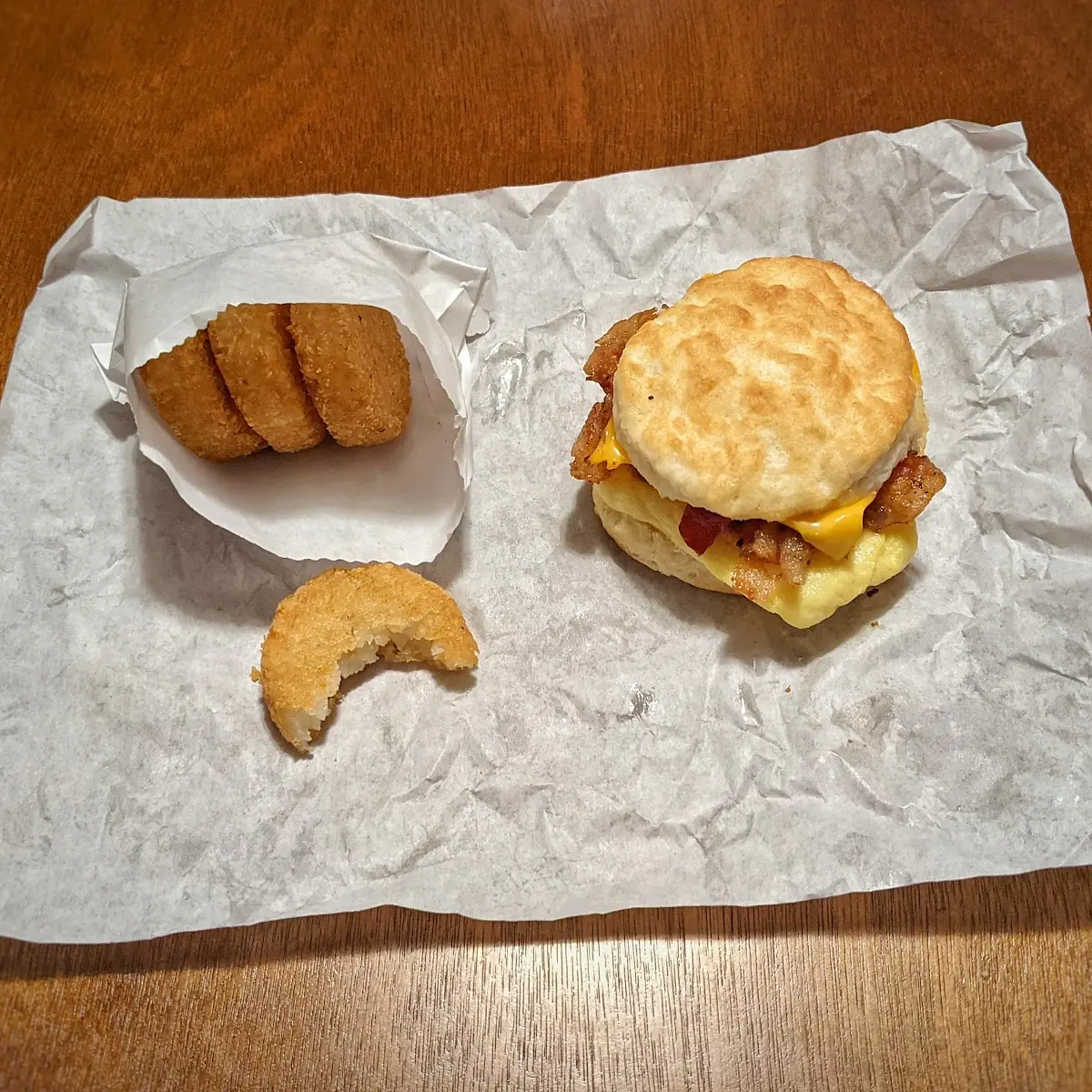 Bacon Egg and Cheese Biscuit with Hash Rounds