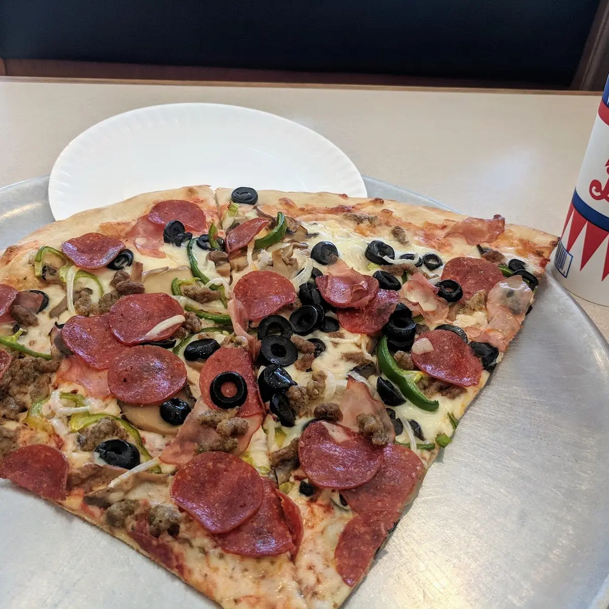 Supreme Pizza by the Slice