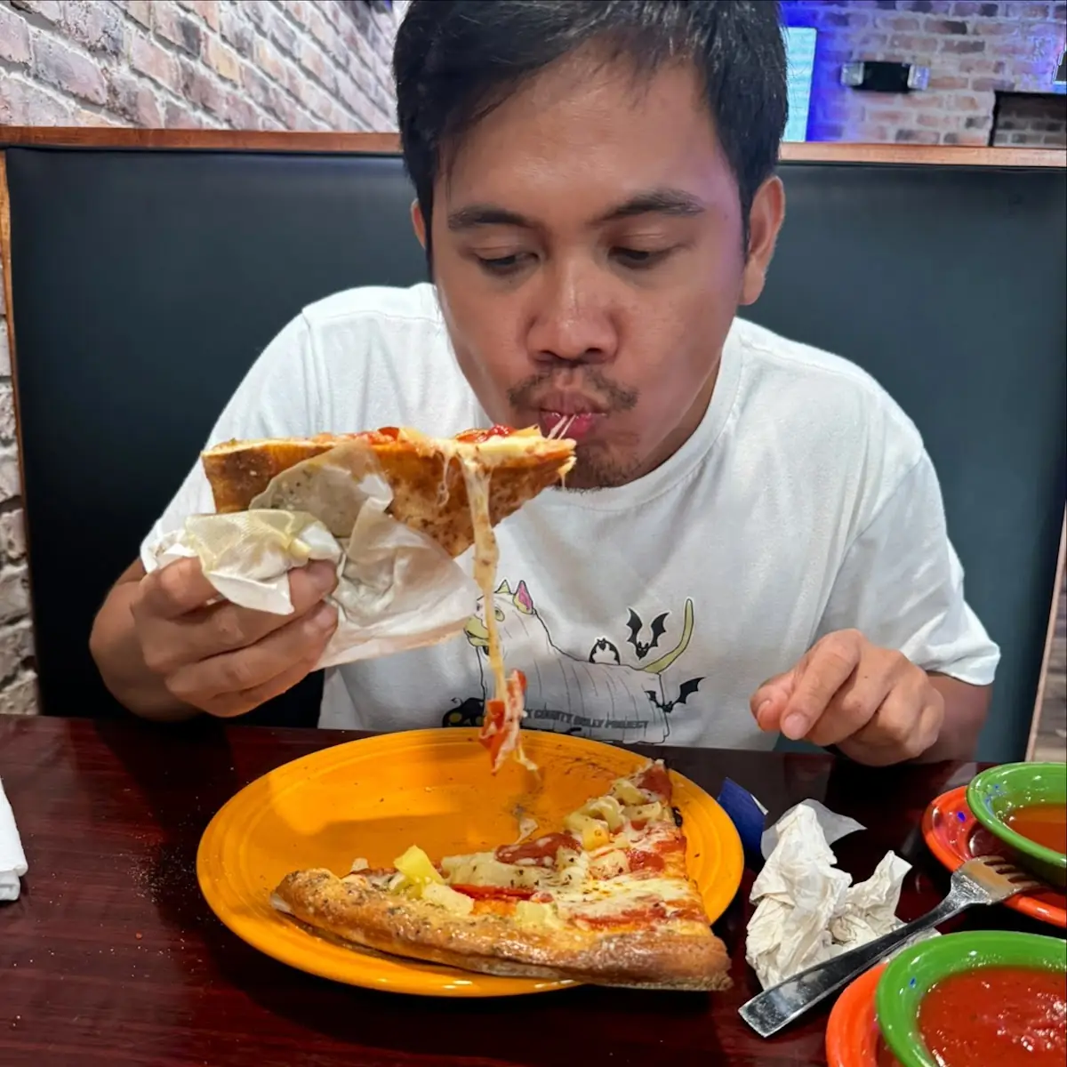 Cheese Pepperoni and Pineapple Pizza Slice