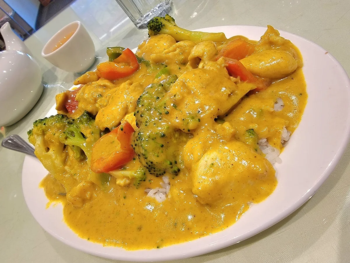 Curry Chicken with Steam Rice Broccoli Peppers, Flourishing