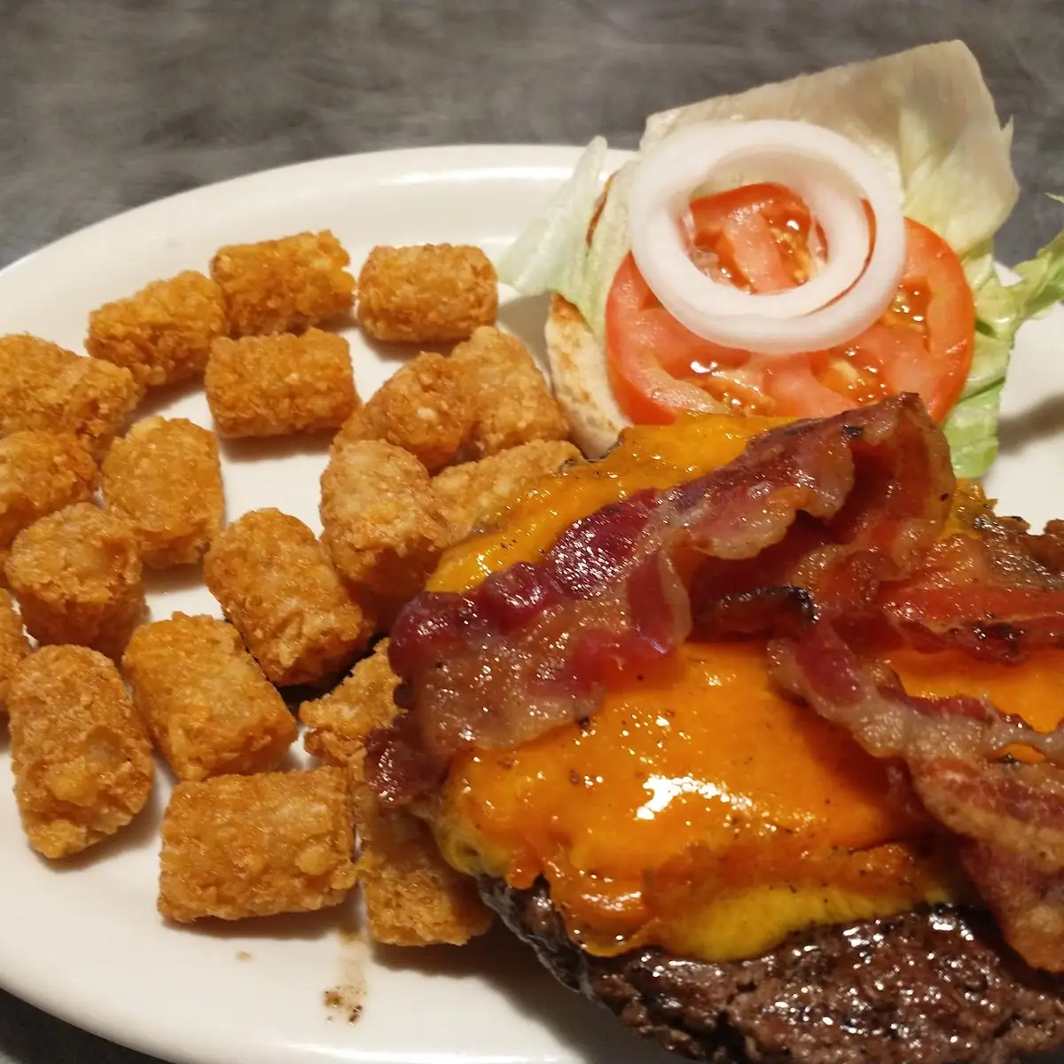 8 Oz Cheddar Bacon Cheeseburger with Tots