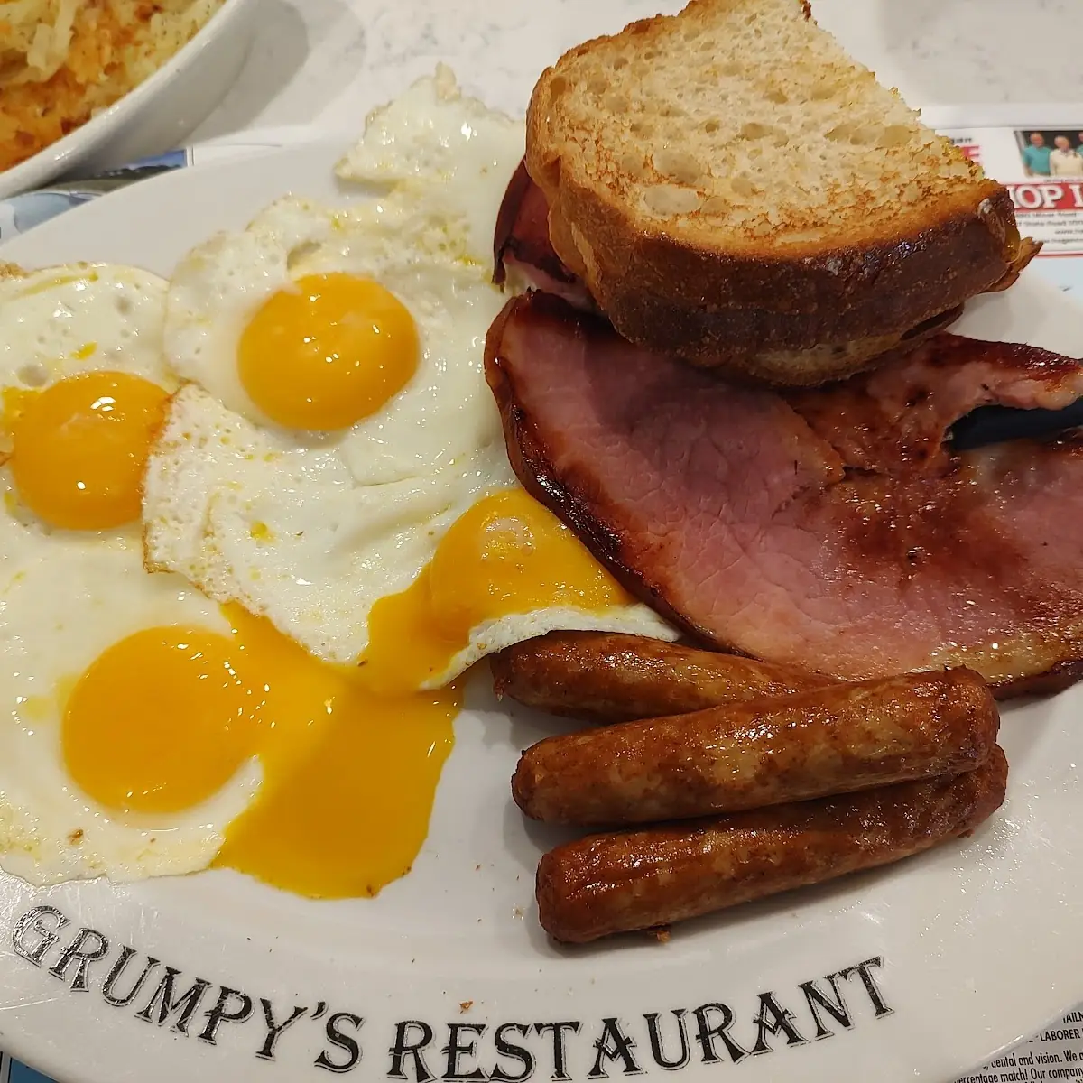 Four Eggs Sunny Side Up Turkey Sausage and Ham