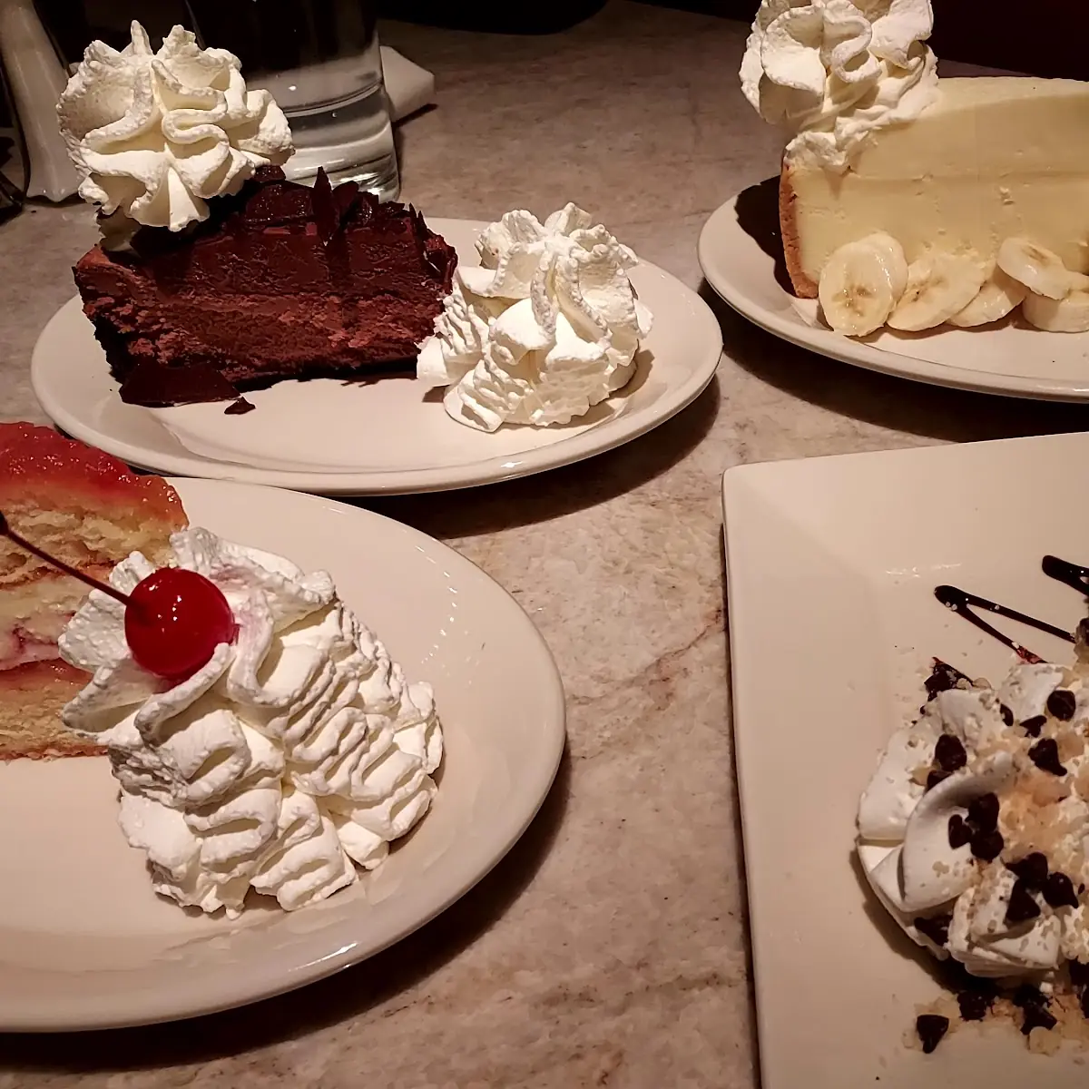 Chocolate Mousse Pineapple Upside Down Chocolate Cookie Dough and Banana Creme Cheesecakes