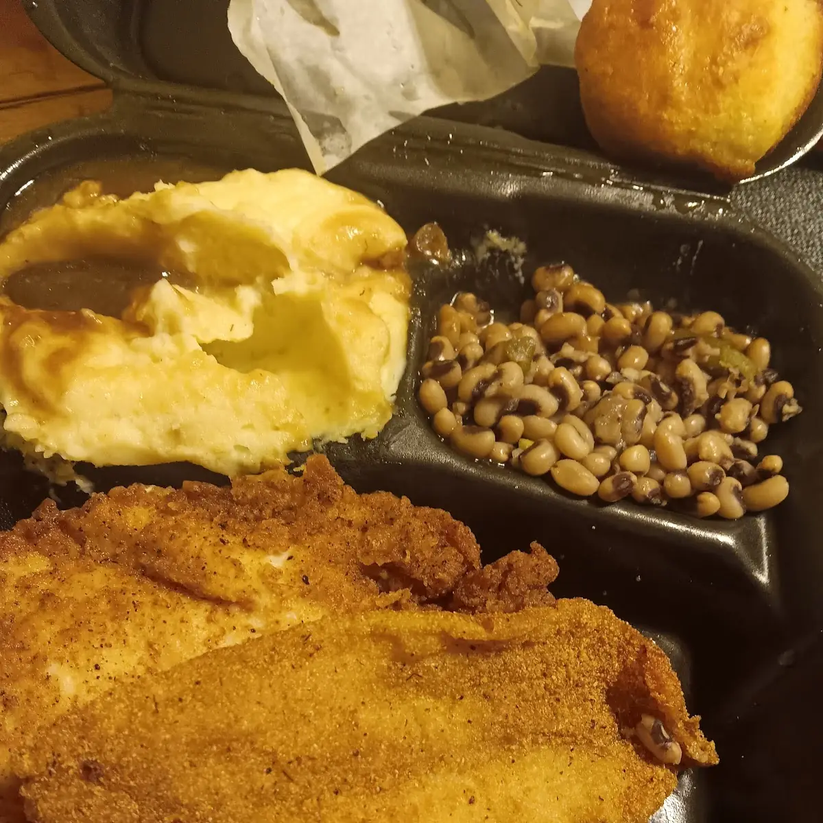 Fish with 2 Sides Mashed Potatoes and Blackened Peas with Corn Muffin