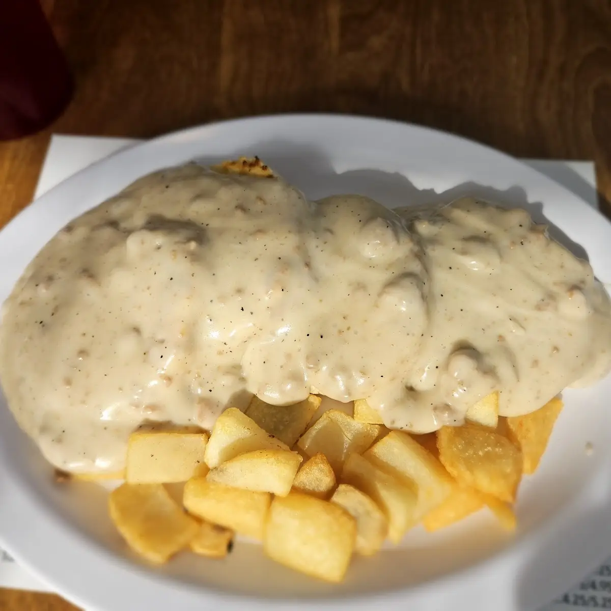 Sausage Gravy over Biscuits