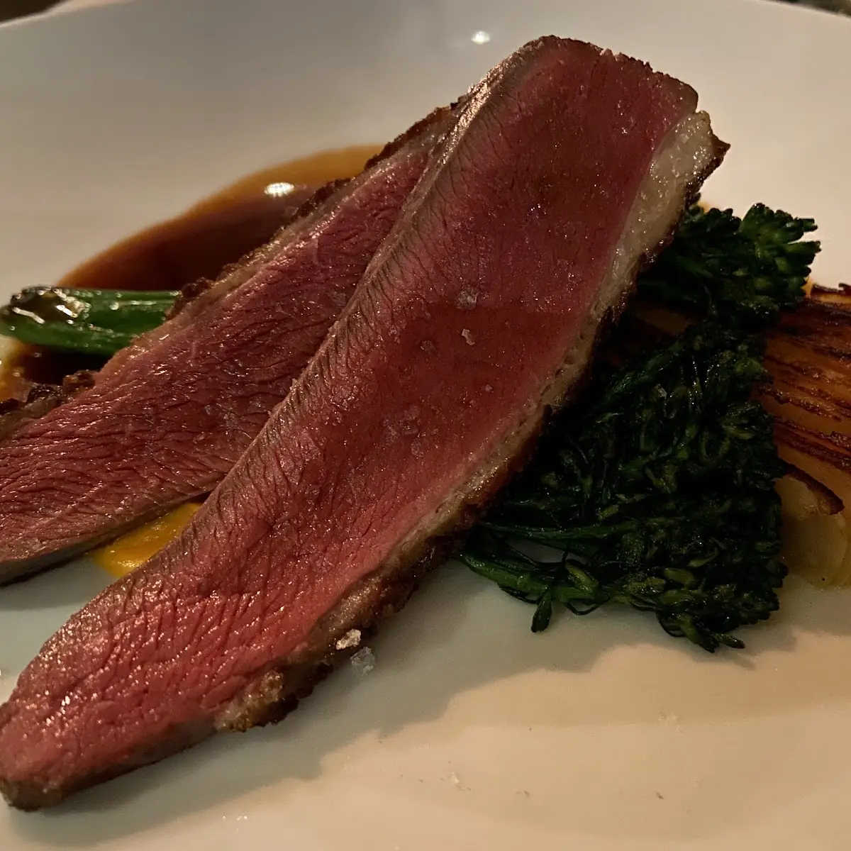 Honey Roasted Duck Breast Confit Potato Fondant Bourbon & Vanilla-Soaked Cherries, Treadwell Cuisine